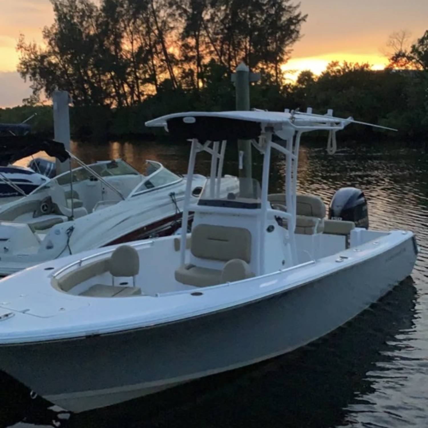 My wife and I took our new 2018 Sportsman 212 for our first sunset cruise and took this photo b...