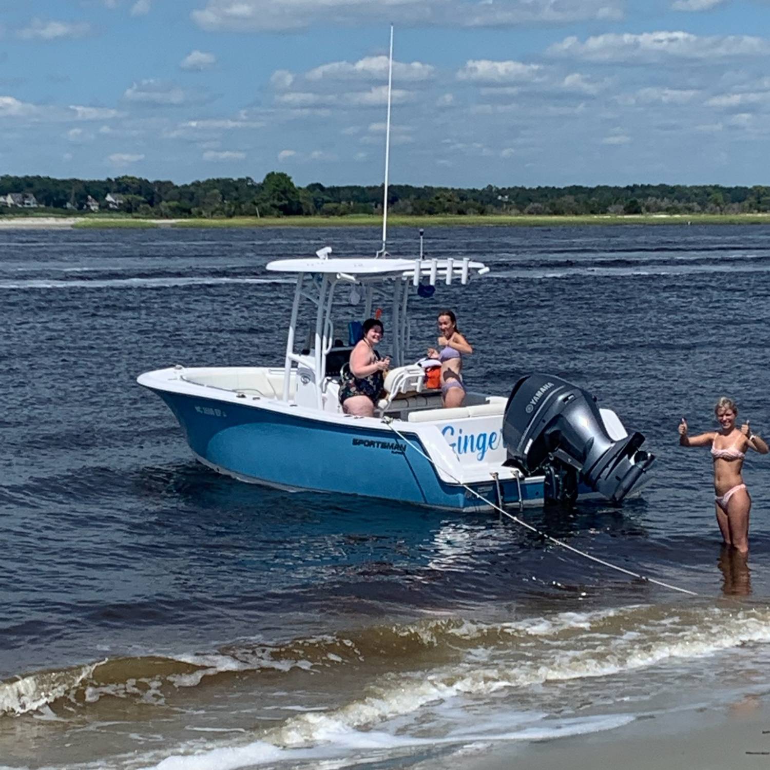 Labor Day weekend beached at Bird Island.  Kids had a blast using the Sportsman as a diving board.