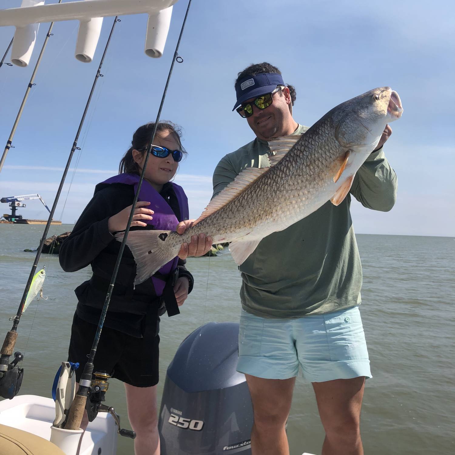 Title: Addie and Dad - On board their Sportsman Masters 227 Bay Boat - Location: Cameron Jetties. Participating in the Photo Contest #SportsmanApril