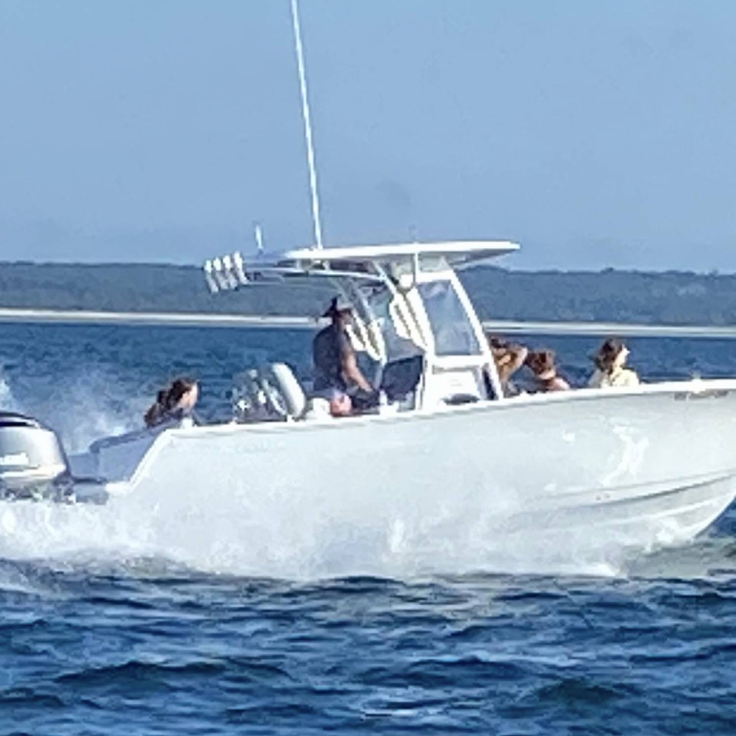 Title: Cruising the Bay - On board their Sportsman Heritage 241 Center Console - Location: Cape Cod Bay. Participating in the Photo Contest #SportsmanApril