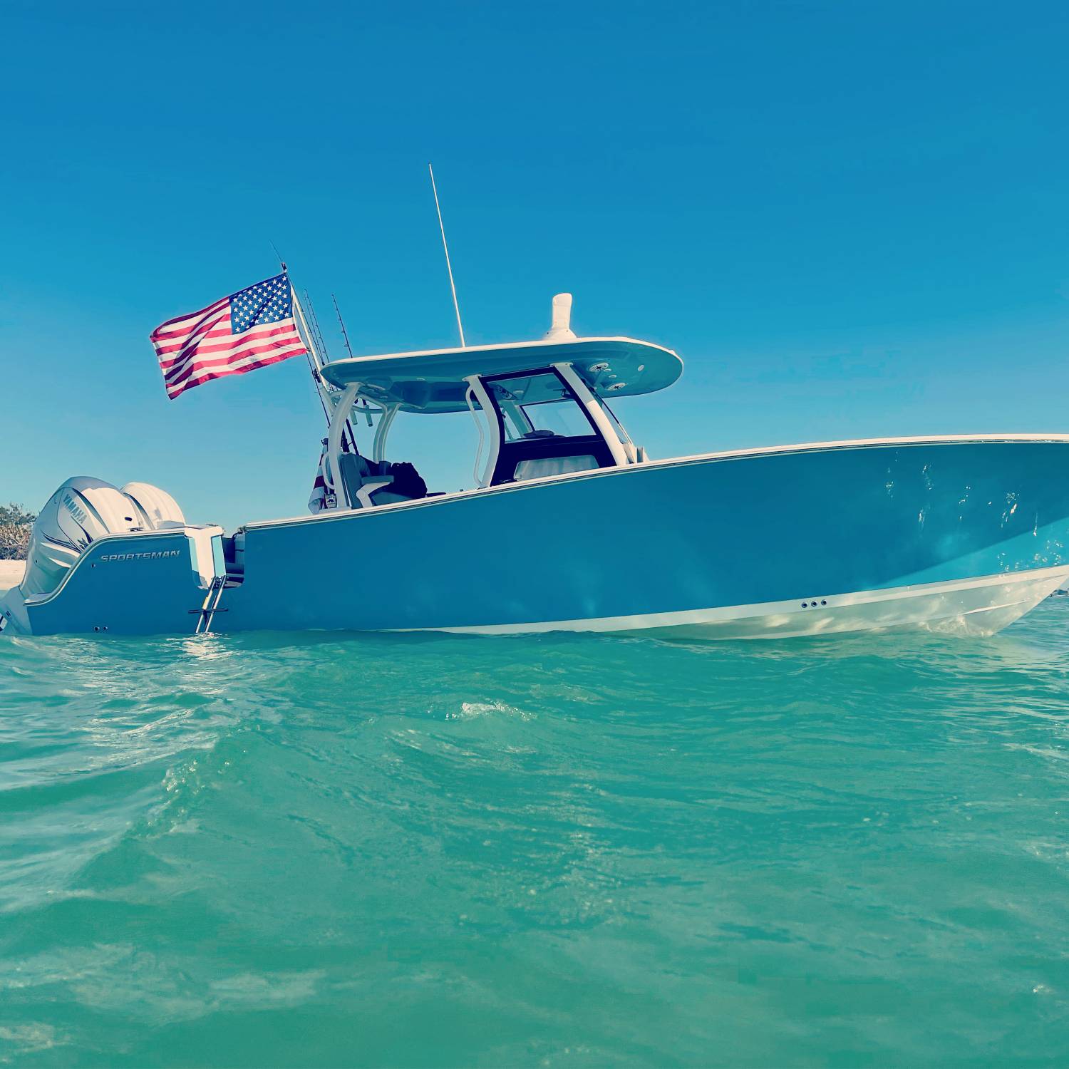 Title: At Ease… - On board their Sportsman Open 322 Center Console - Location: Cayo Costa State Park, SWFL. Participating in the Photo Contest #SportsmanApril