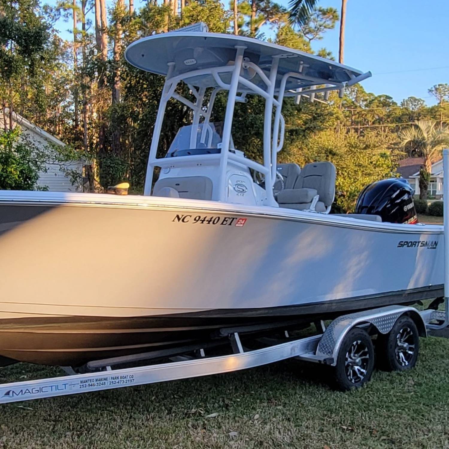 Title: Worth every mile - On board their Sportsman Open 212 Center Console - Location: Front yard. Participating in the Photo Contest #SportsmanApril