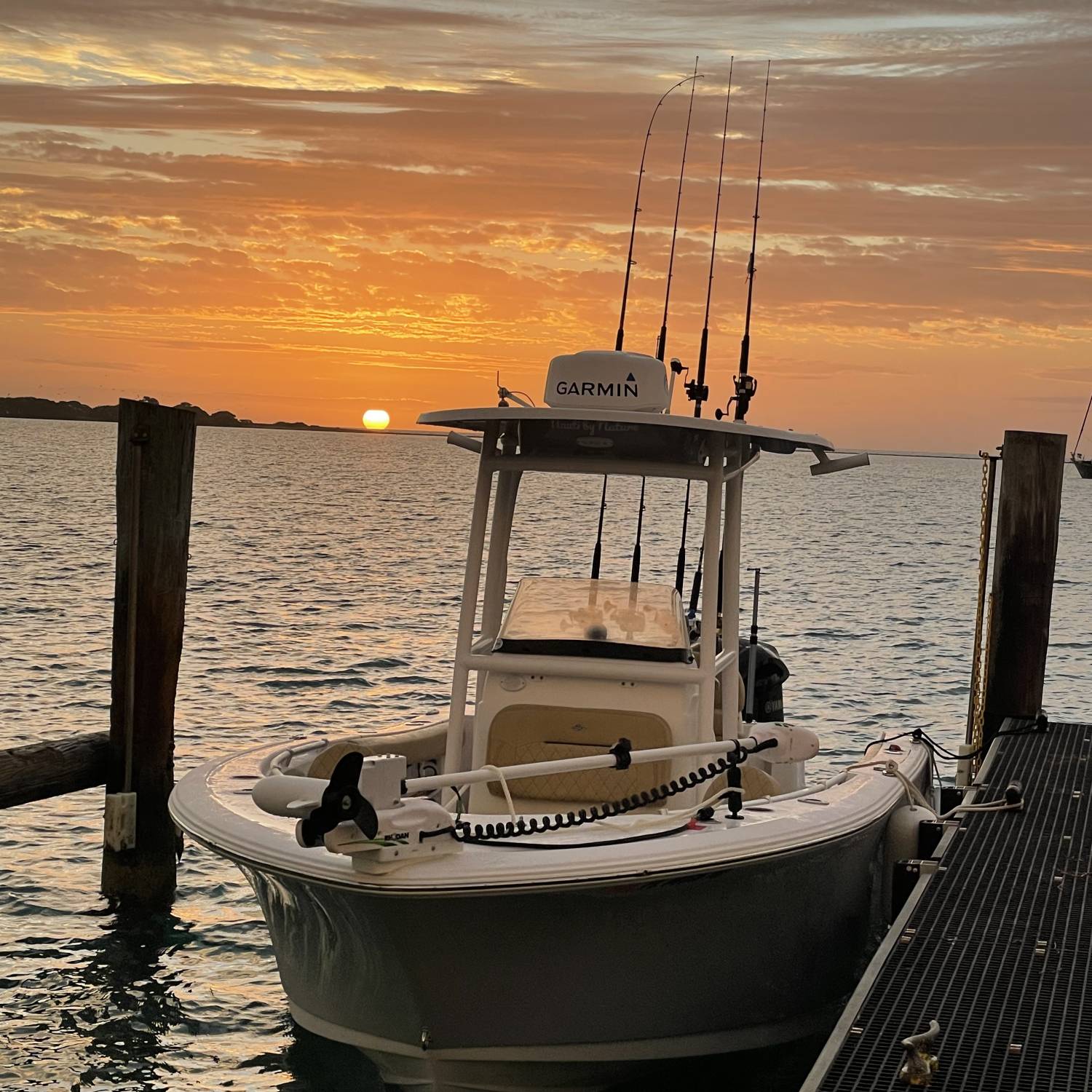 Title: Chasing Sunsets - On board their Sportsman Open 232 Center Console - Location: Dry Tortugas Ft. Jefferson. Participating in the Photo Contest #SportsmanApril