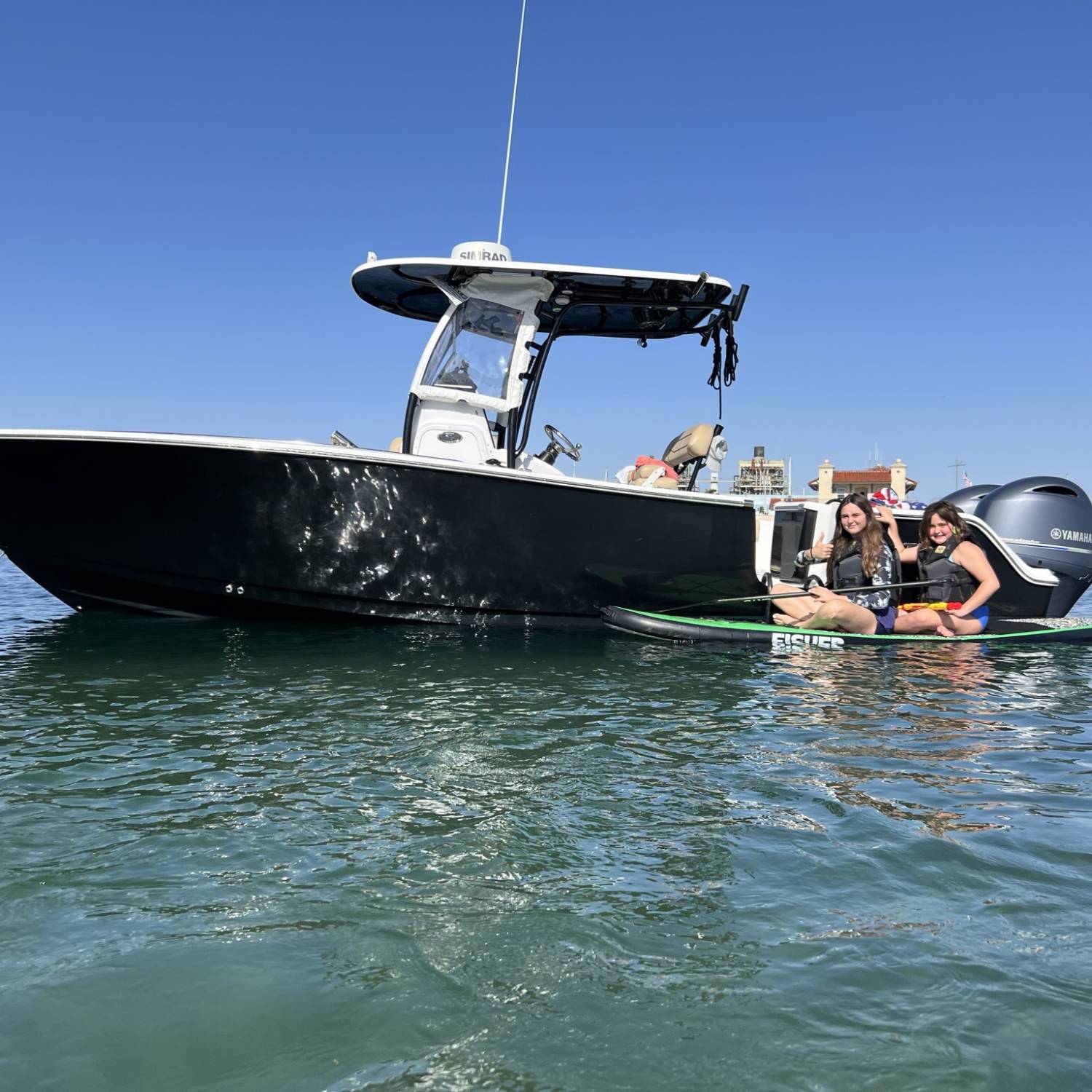 My 2017 Sportsman Open 252 anchored in 3feet on a sand bar in Redondo Beach CA. For size, I had...