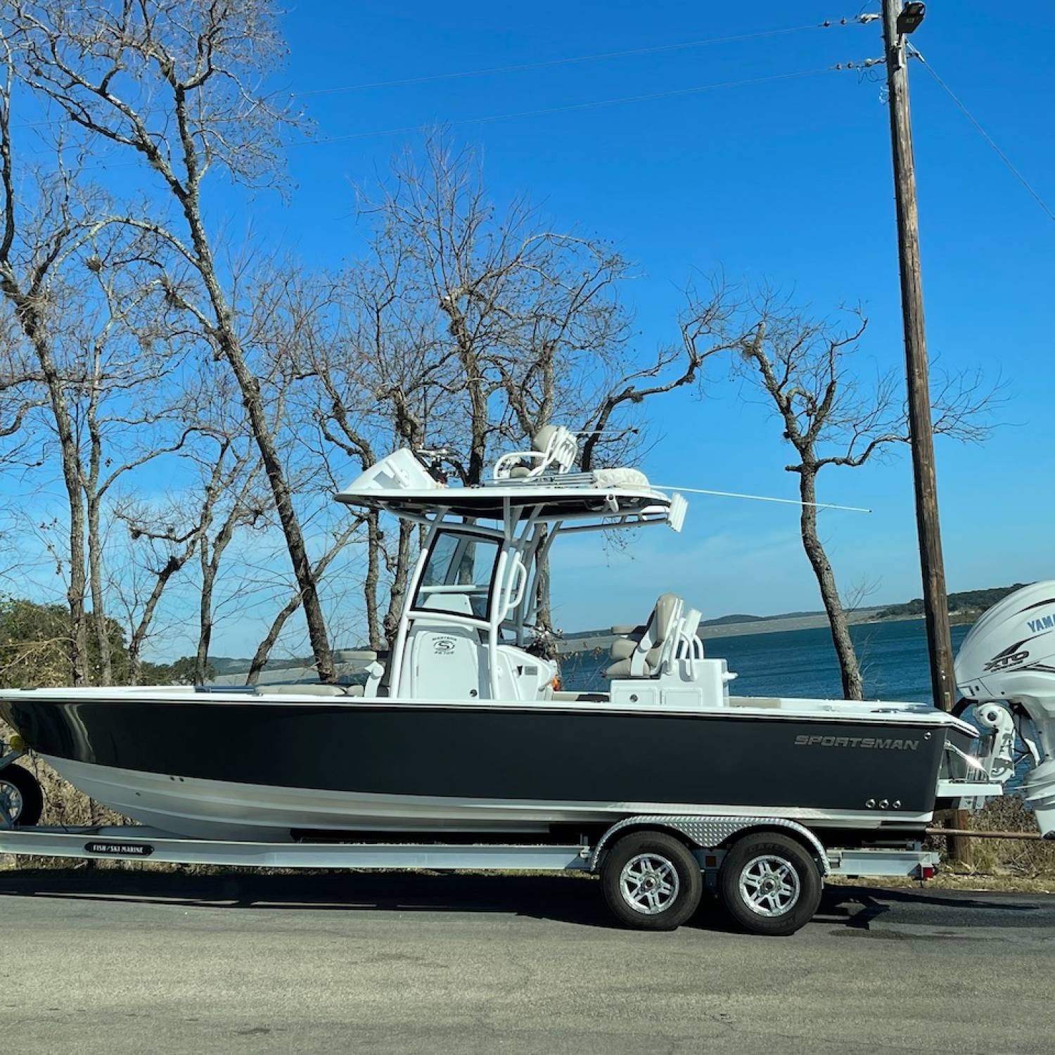 Title: Fun day on the lake - On board their Sportsman Masters 267OE Bay Boat - Location: Canyon Lake, TX. Participating in the Photo Contest #SportsmanApril