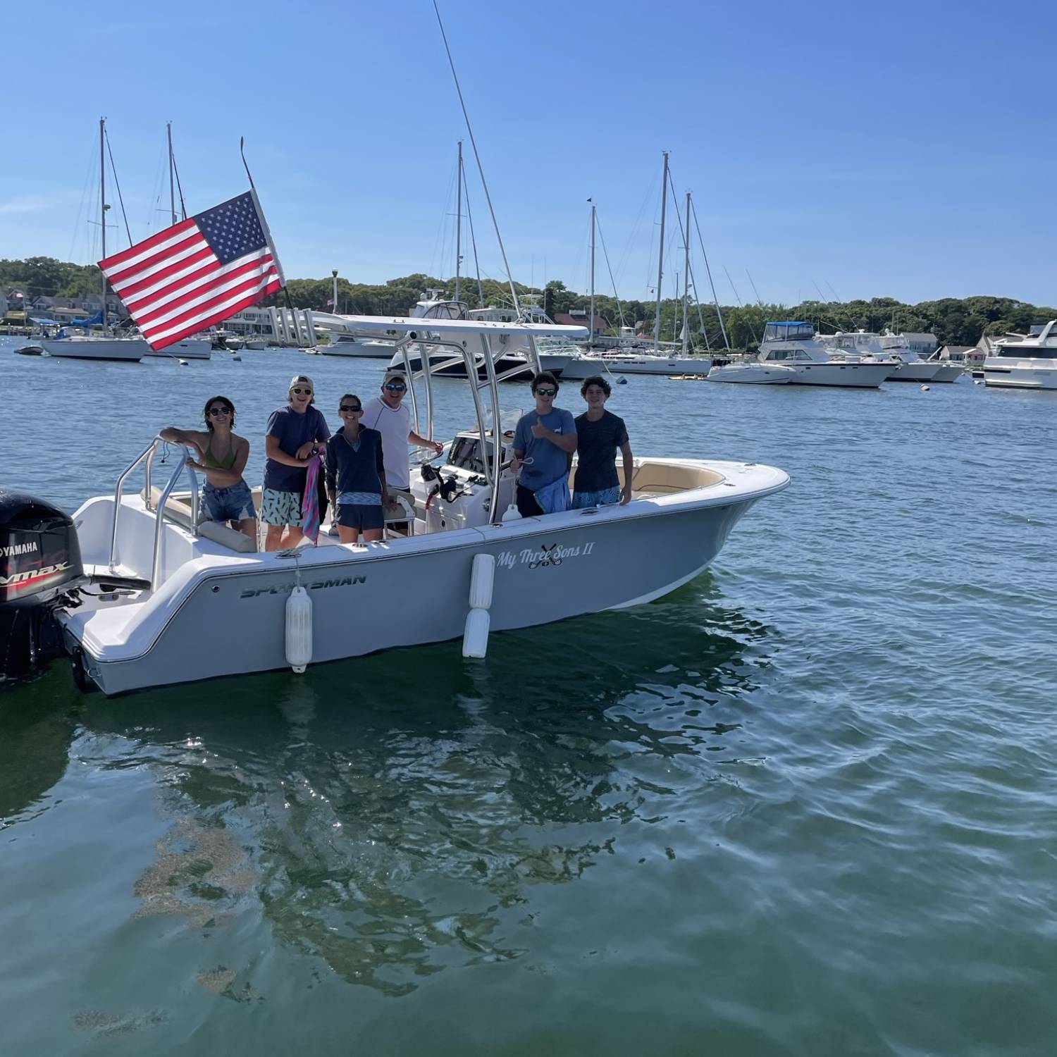 Title: Family Picture - On board their Sportsman Heritage 231 Center Console - Location: Oak Bluffs Martha’s Vineyard MA. Participating in the Photo Contest #SportsmanAugust