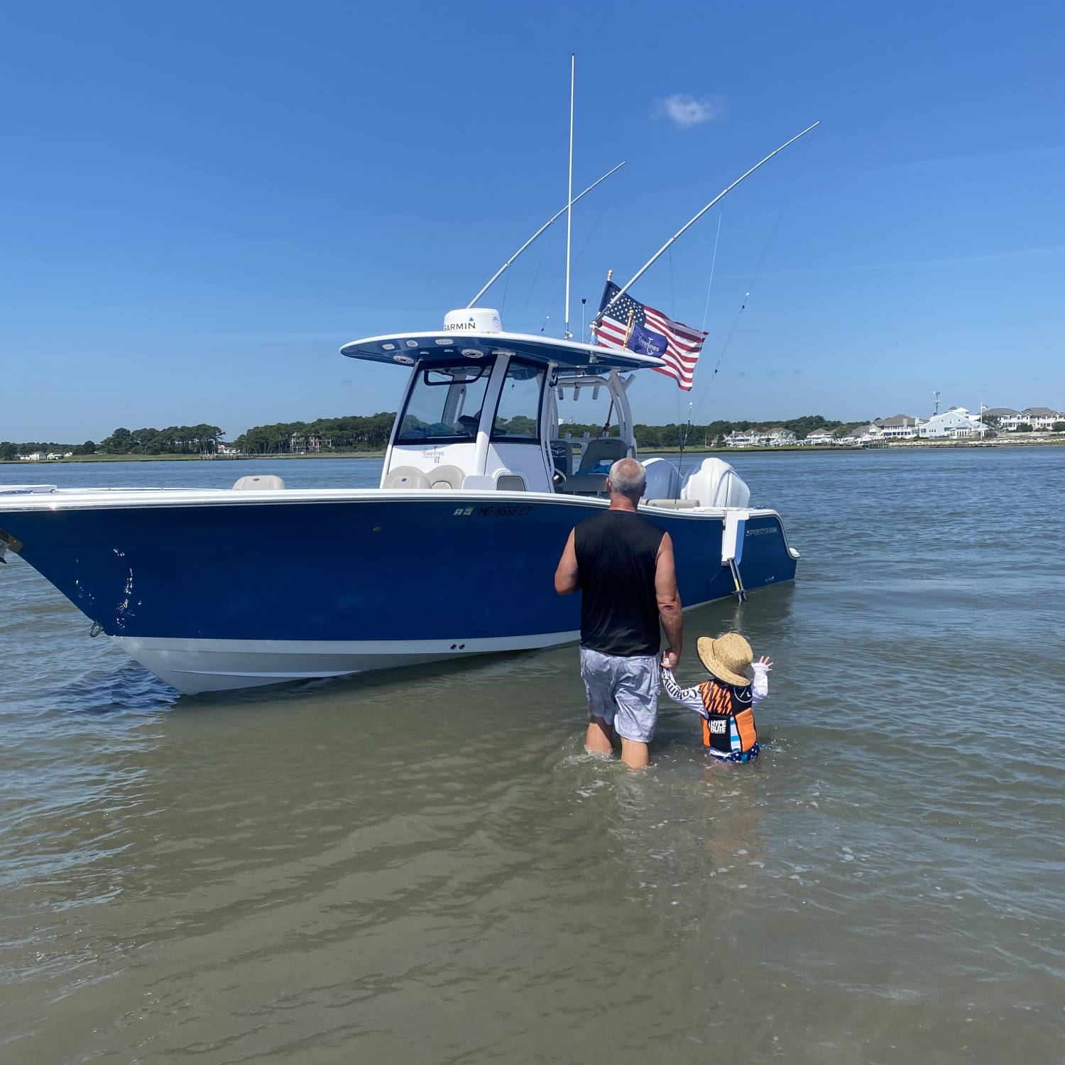Title: G-pop & G-son enjoying the waters - On board their Sportsman Open 282 Center Console - Location: Ocean City MD. Participating in the Photo Contest #SportsmanAugust