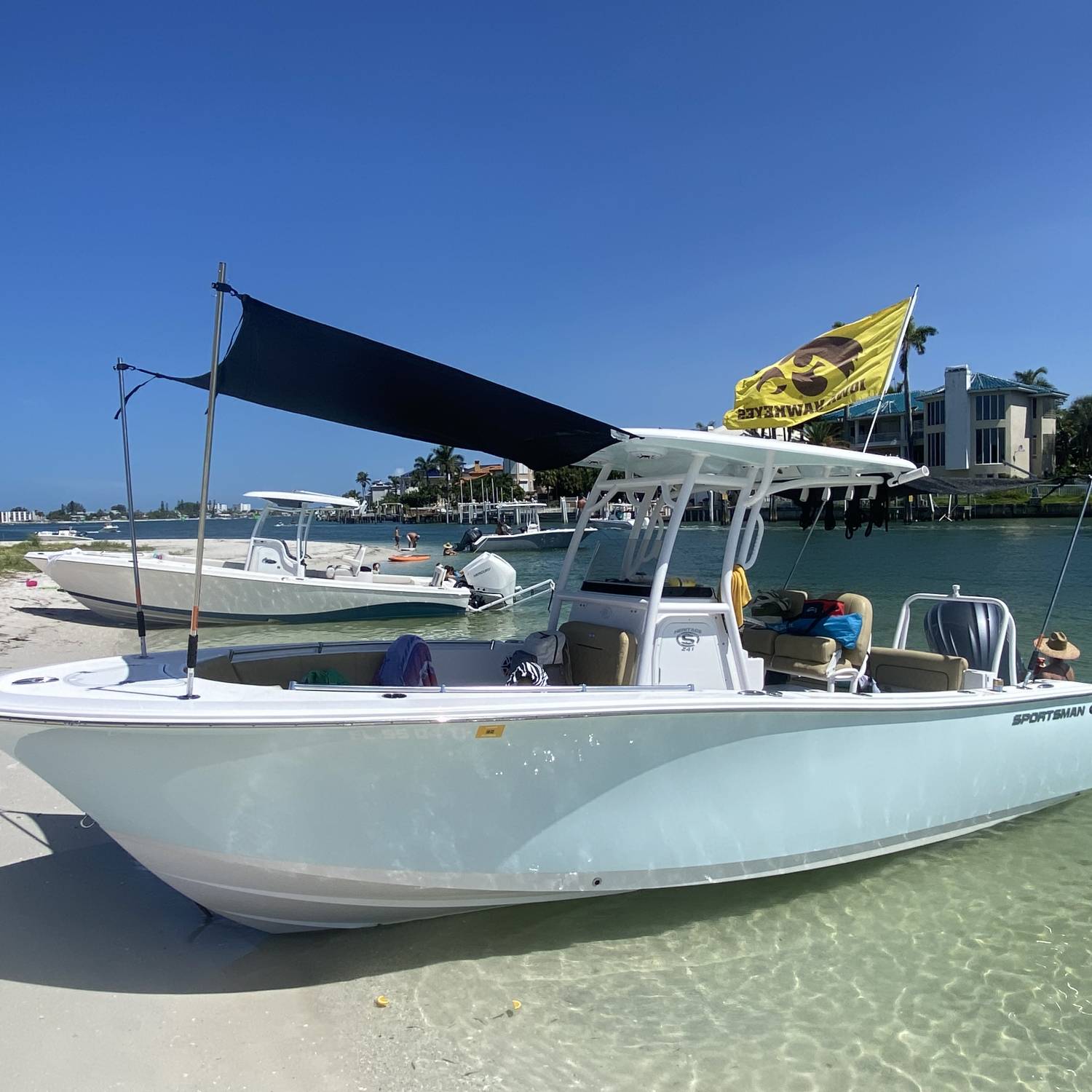 Title: Her first beach! - On board their Sportsman Heritage 241 Center Console - Location: Shell Key. Participating in the Photo Contest #SportsmanAugust