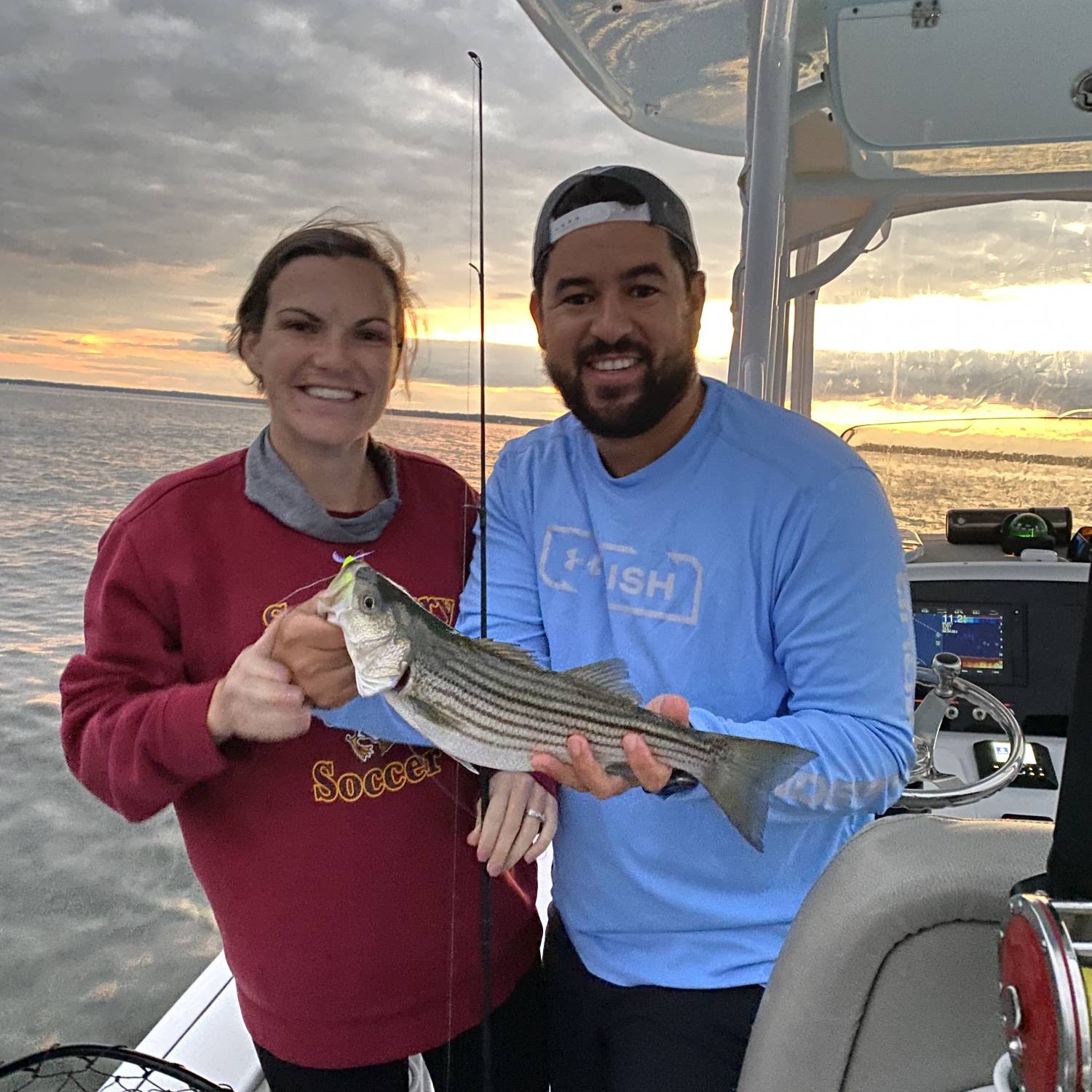 Title: Week before due date fishing the bay - On board their Sportsman Open 232 Center Console - Location: Thomas Point, Chesapeake Bay, Maryland. Participating in the Photo Contest #SportsmanFebruary2022
