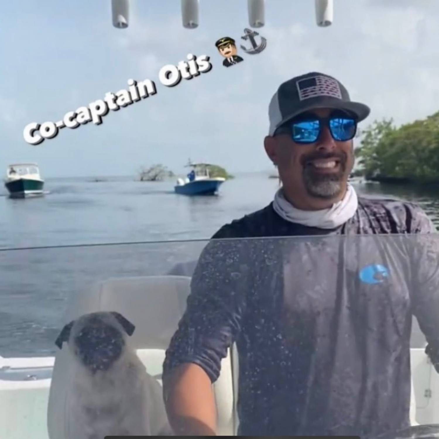 Title: Co Captain Otis the Pug on the way to the sandbar - On board their Sportsman Open 232 Center Console - Location: Miami Florida, Black Point Marina. Participating in the Photo Contest #SportsmanFebruary2022