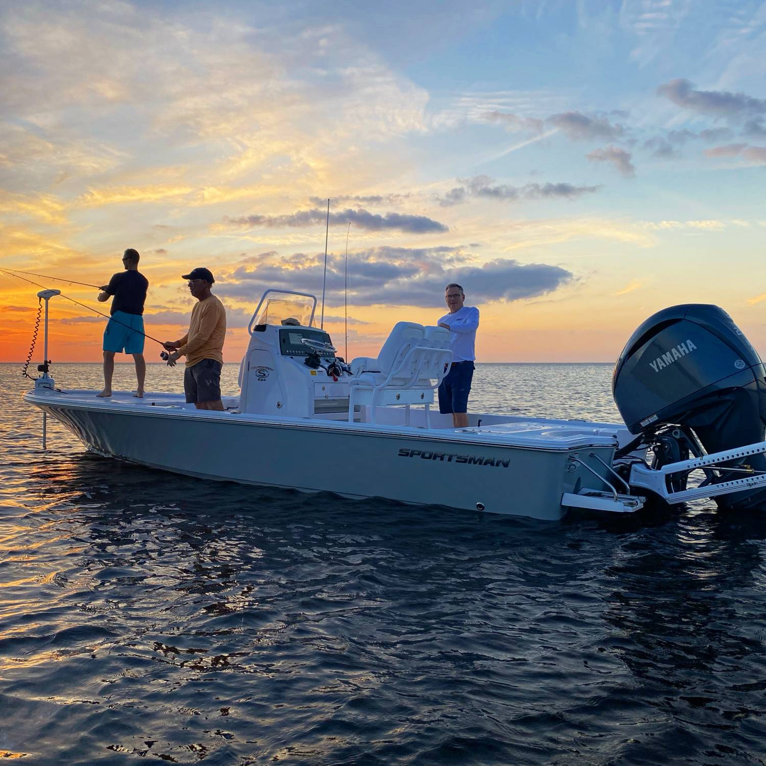 Sportsman 234T bay boat at sunset in Port Richey, FL on the grass flats with the guys.