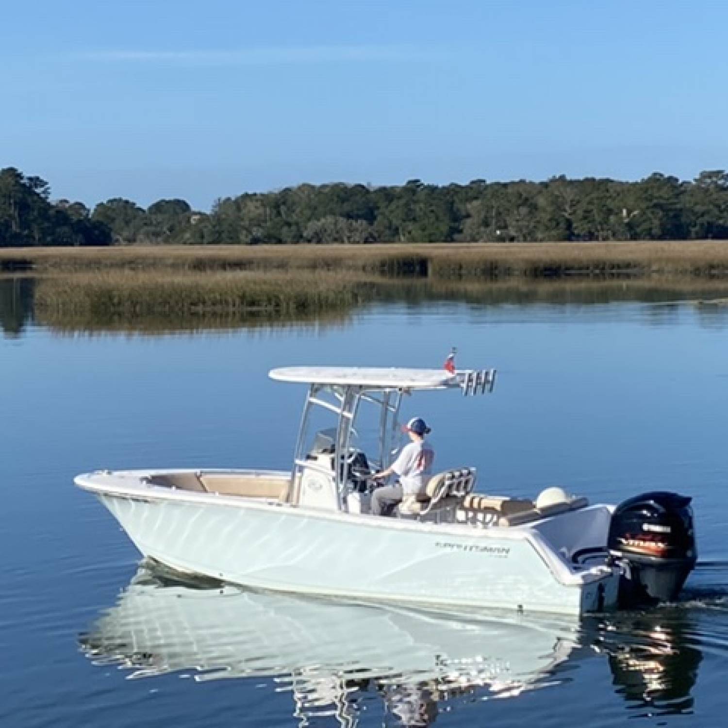Title: If she could drive it back to Wofford, she would! - On board their Sportsman Heritage 231 Center Console - Location: Store Creek Edisto Island SC. Participating in the Photo Contest #SportsmanJanuary2022