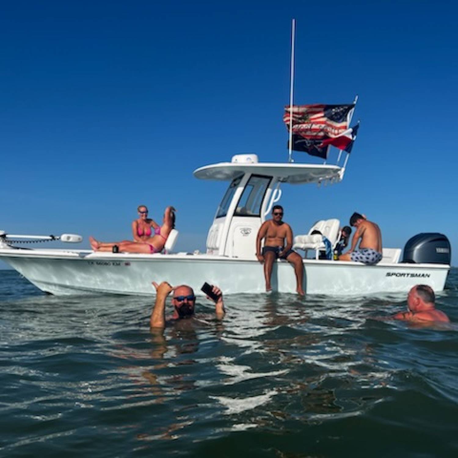 Title: Enjoying time with friends - On board their Sportsman Masters 247 Bay Boat - Location: Jamiaca Beach, Tx. Participating in the Photo Contest #SportsmanJuly