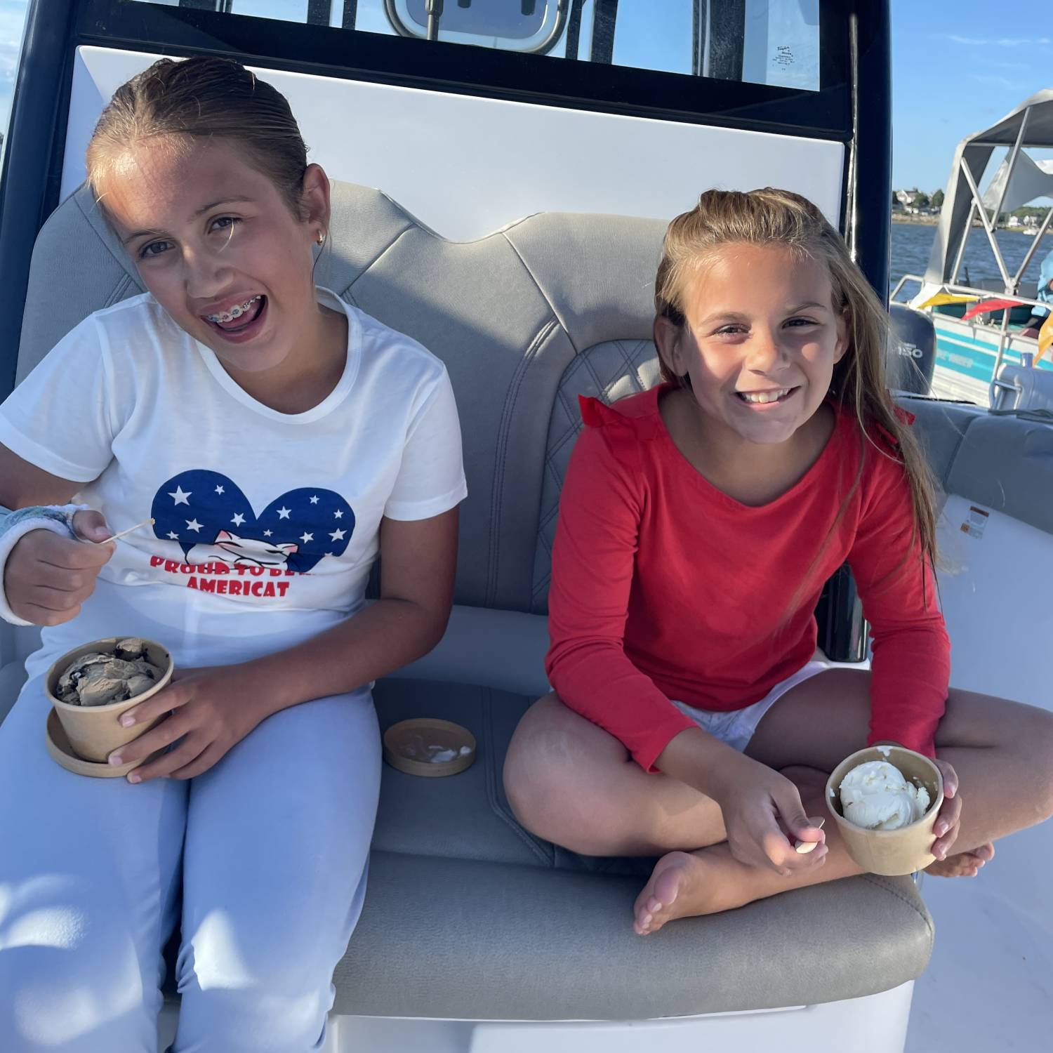 The girls enjoying their ice cream on the 4th of July on our new Open 302.
