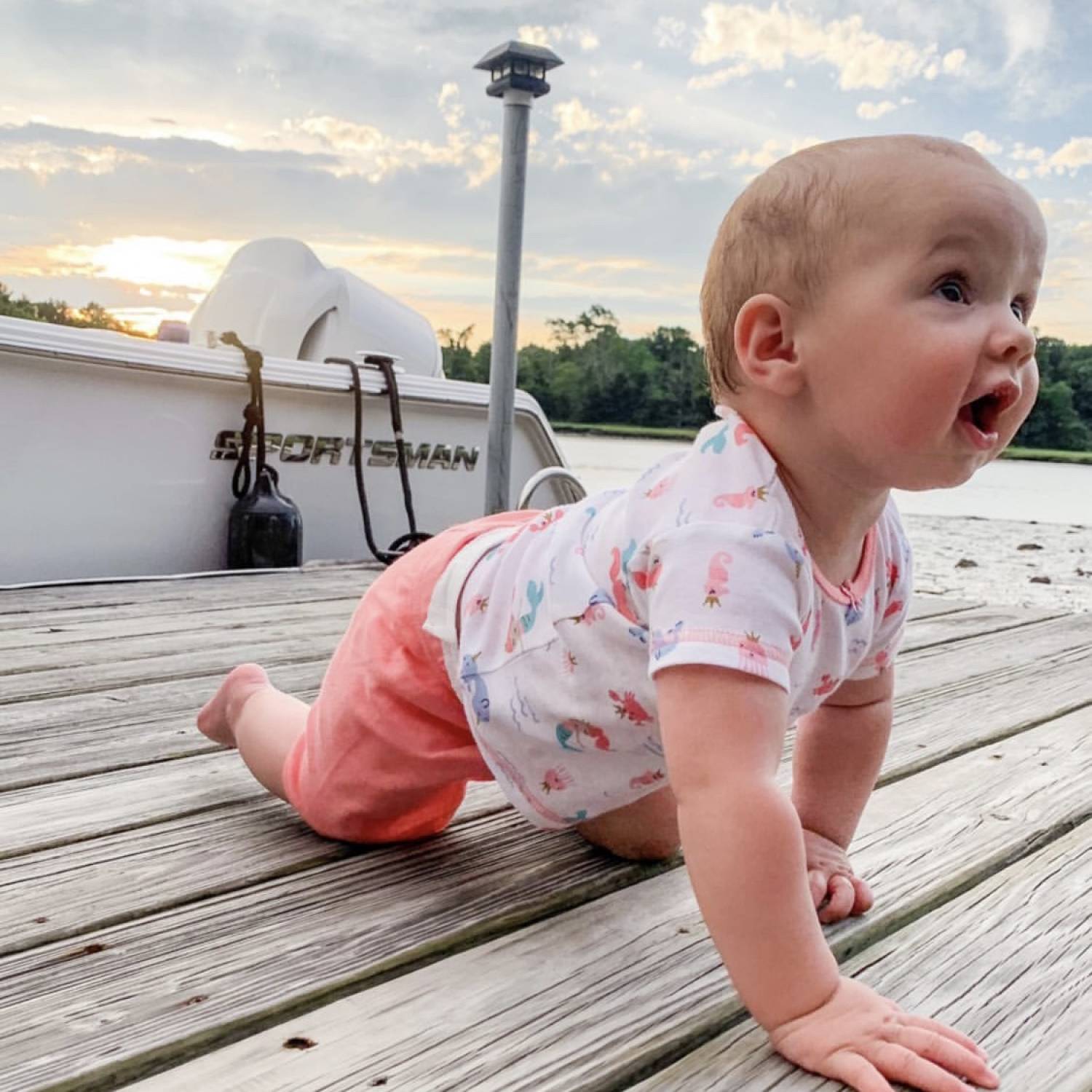 Ella waiting for her first boat ride of on her grandfathers boat!