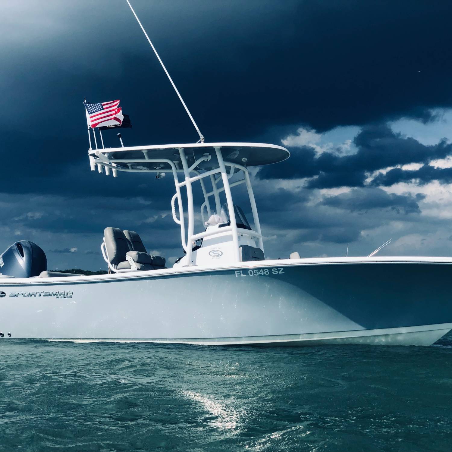 Taken as a storm was rolling in to the Johns Pass sandbar with brilliant sunlight behind us.