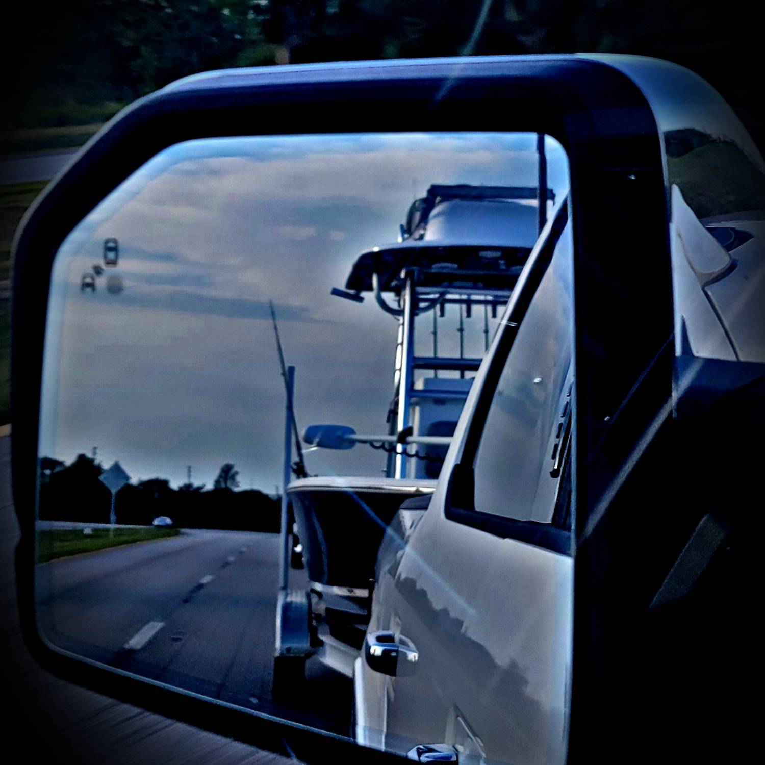 Title: Hard to keep my eyes on the road with this beauty in the mirror. - On board their Sportsman Masters 247 Bay Boat - Location: Lake Placid Fl. Participating in the Photo Contest #SportsmanJuly