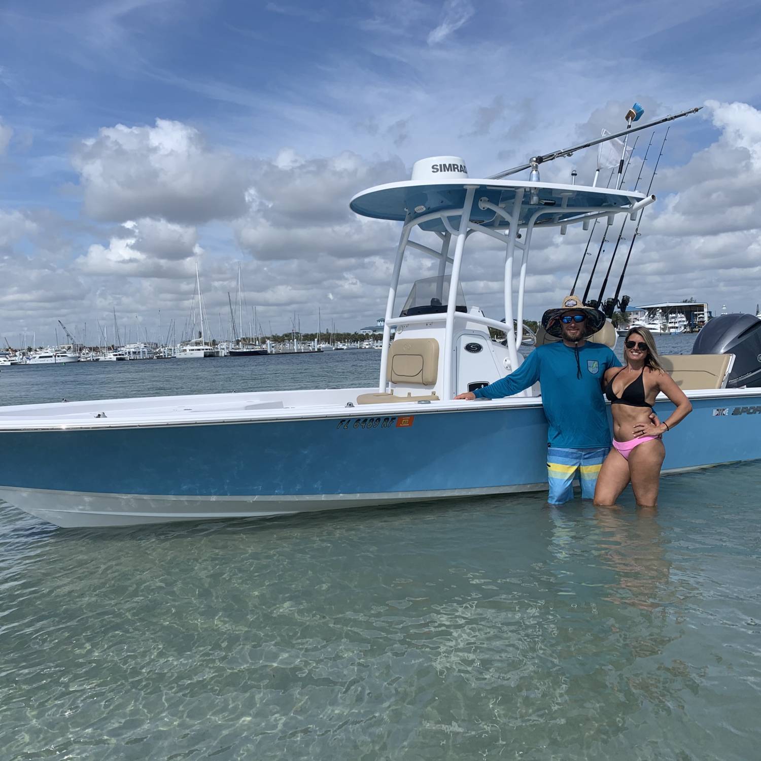 Husband & wife enjoying a gorgeous south Florida Sunday on our sportsman!