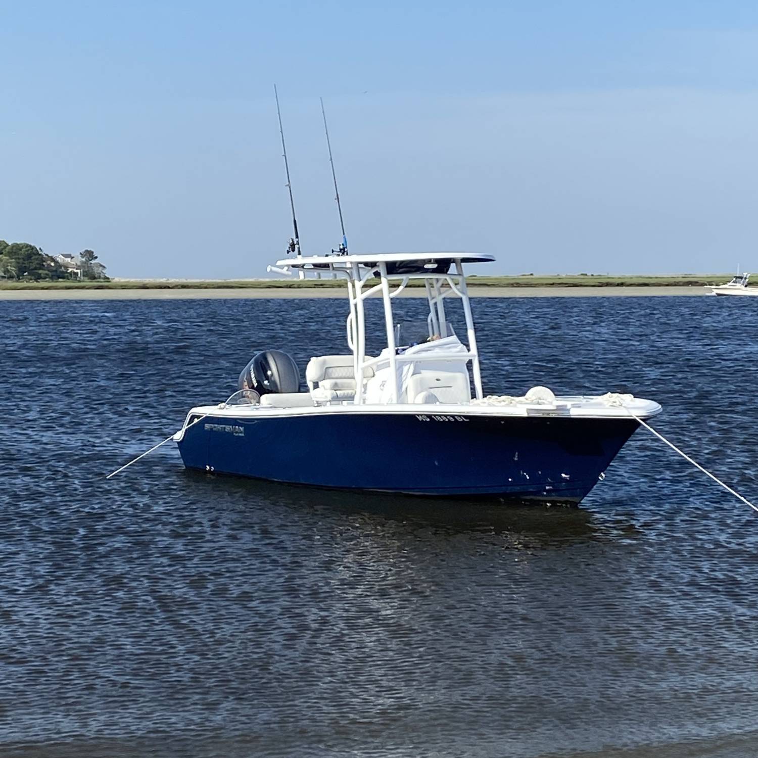 Title: “fore Reel” - On board their Sportsman Open 212 Center Console - Location: The Spit (Marshfield,Ma). Participating in the Photo Contest #SportsmanJune