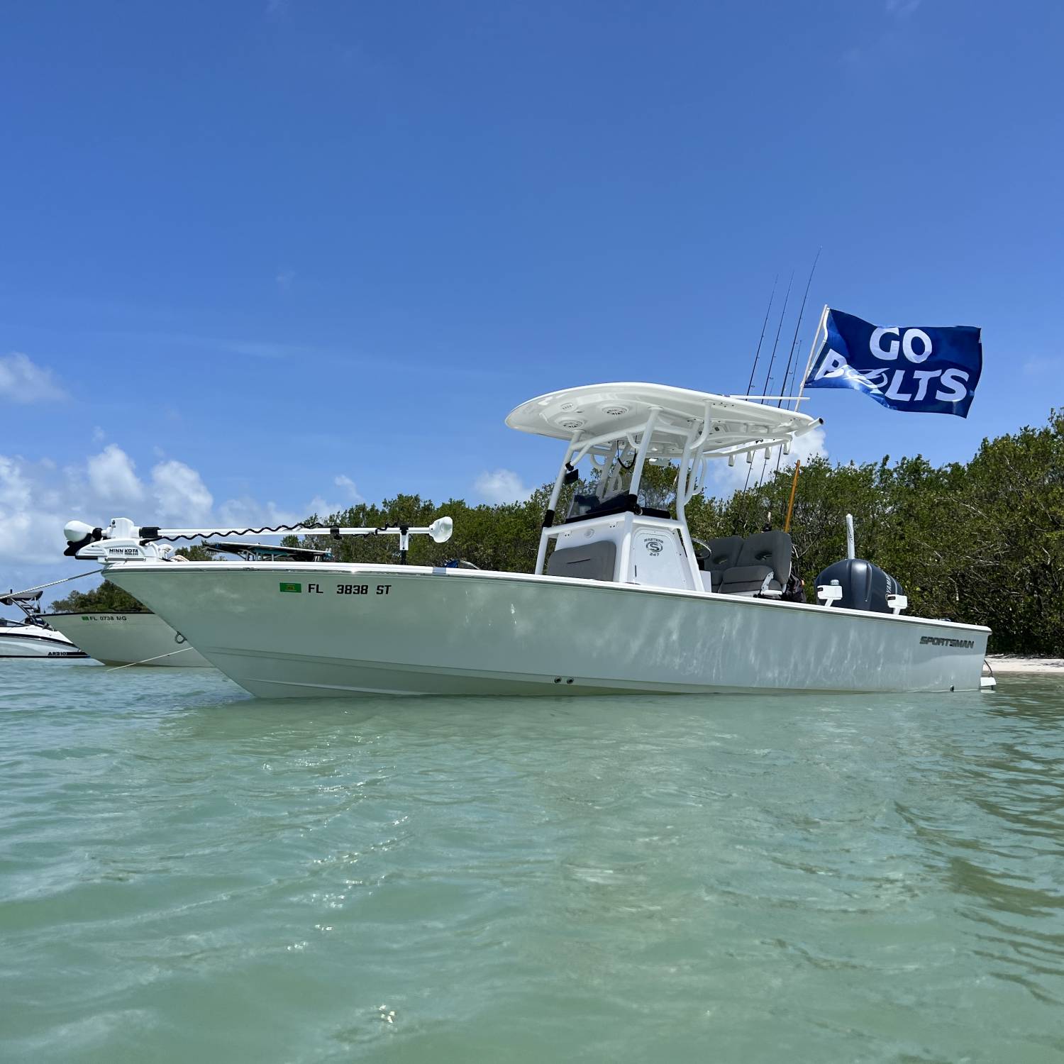 Title: Go Bolts!⚡️ - On board their Sportsman Masters 247 Bay Boat - Location: Stump Pass, Englewood Fl.. Participating in the Photo Contest #SportsmanJune