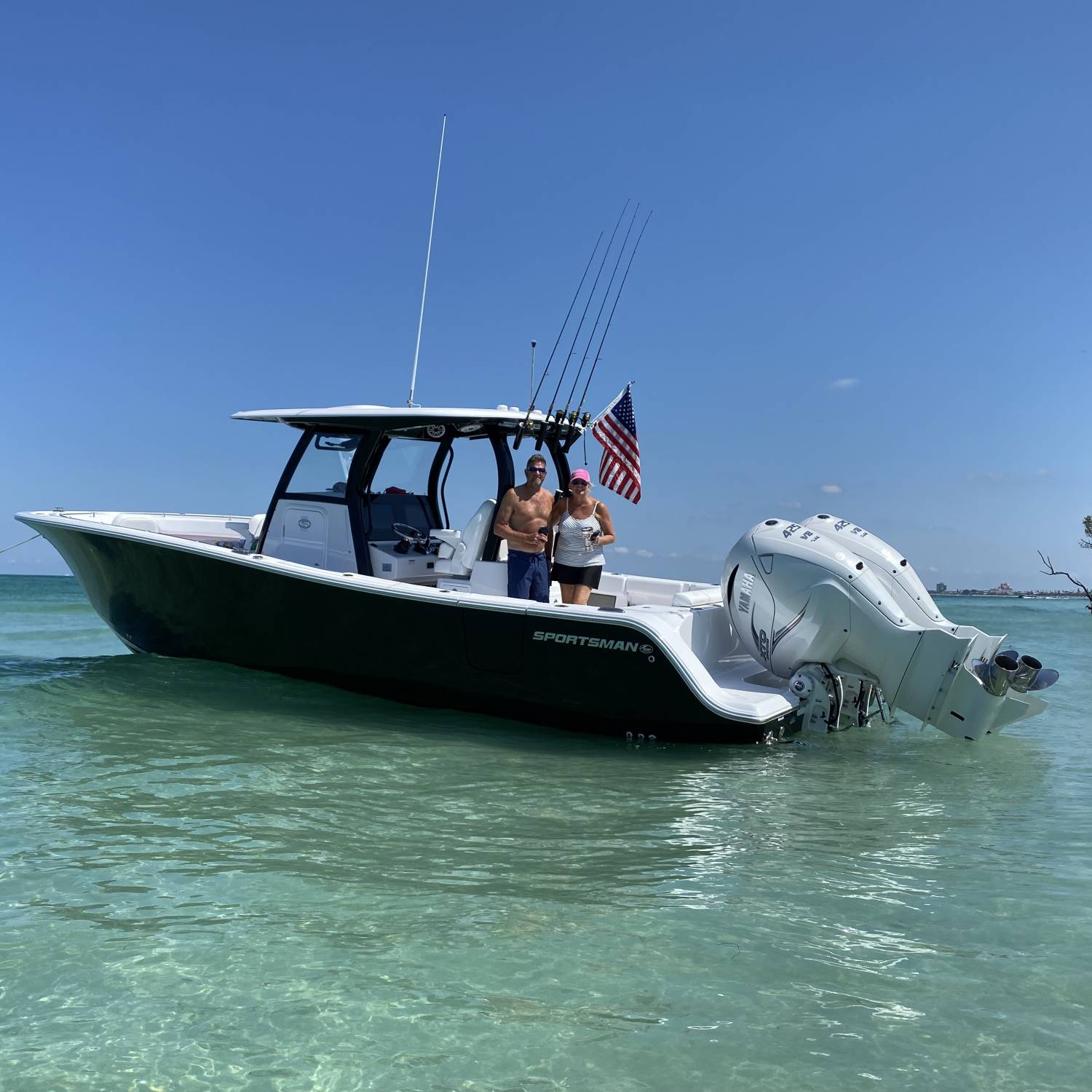 "Get a picture of us on our new boat!"