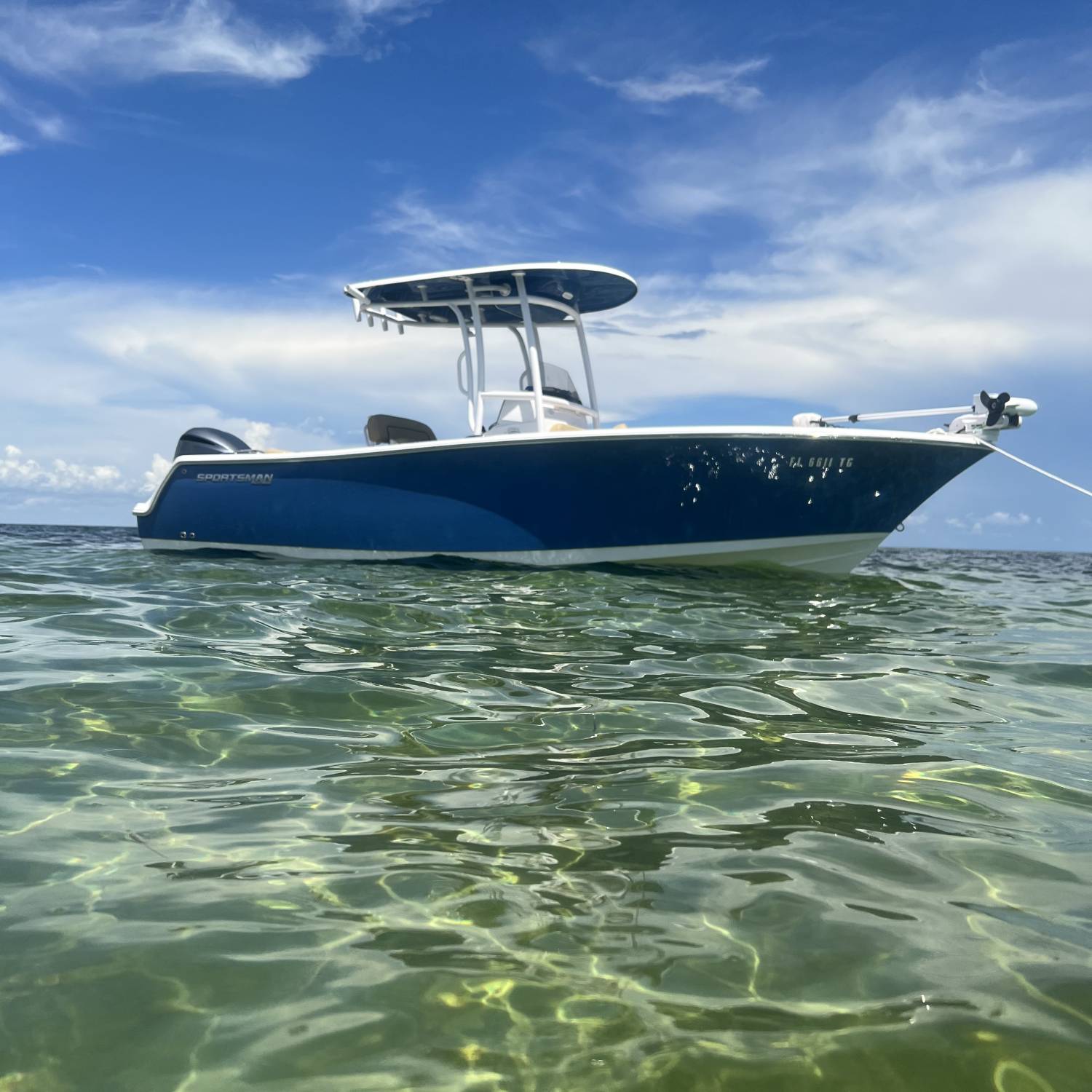 Title: At the sand bar - On board their Sportsman Open 232 Center Console - Location: Ochloknee shoals sandbar. Participating in the Photo Contest #SportsmanOctober
