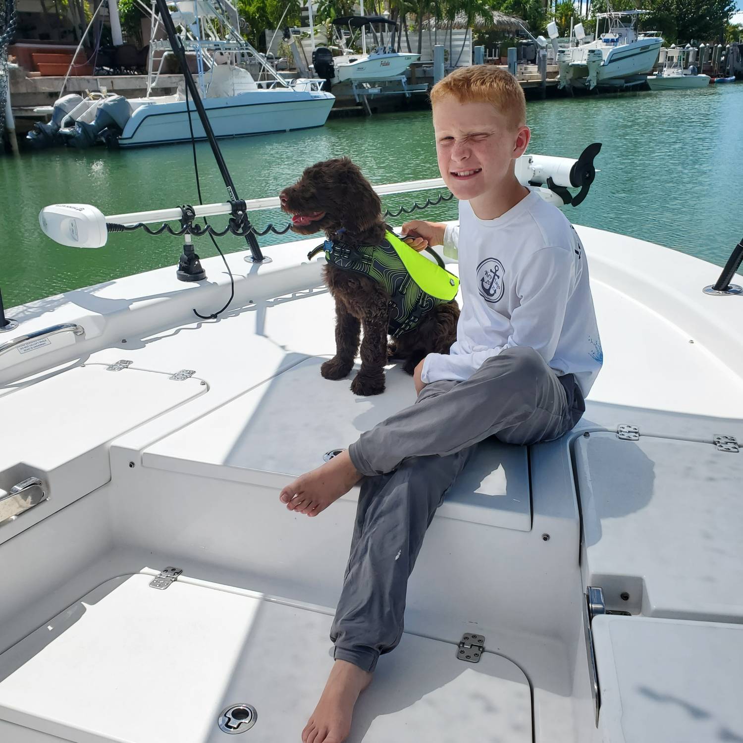 Title: My labordoodle first ride - On board their Sportsman Masters 267 Bay Boat - Location: Marathon key. Participating in the Photo Contest #SportsmanSeptember