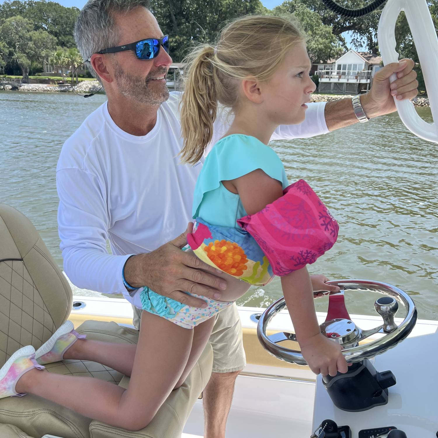 Title: Future Captain - On board their Sportsman Masters 247OE Bay Boat - Location: Wapoo Cut. Participating in the Photo Contest #SportsmanAugust2023