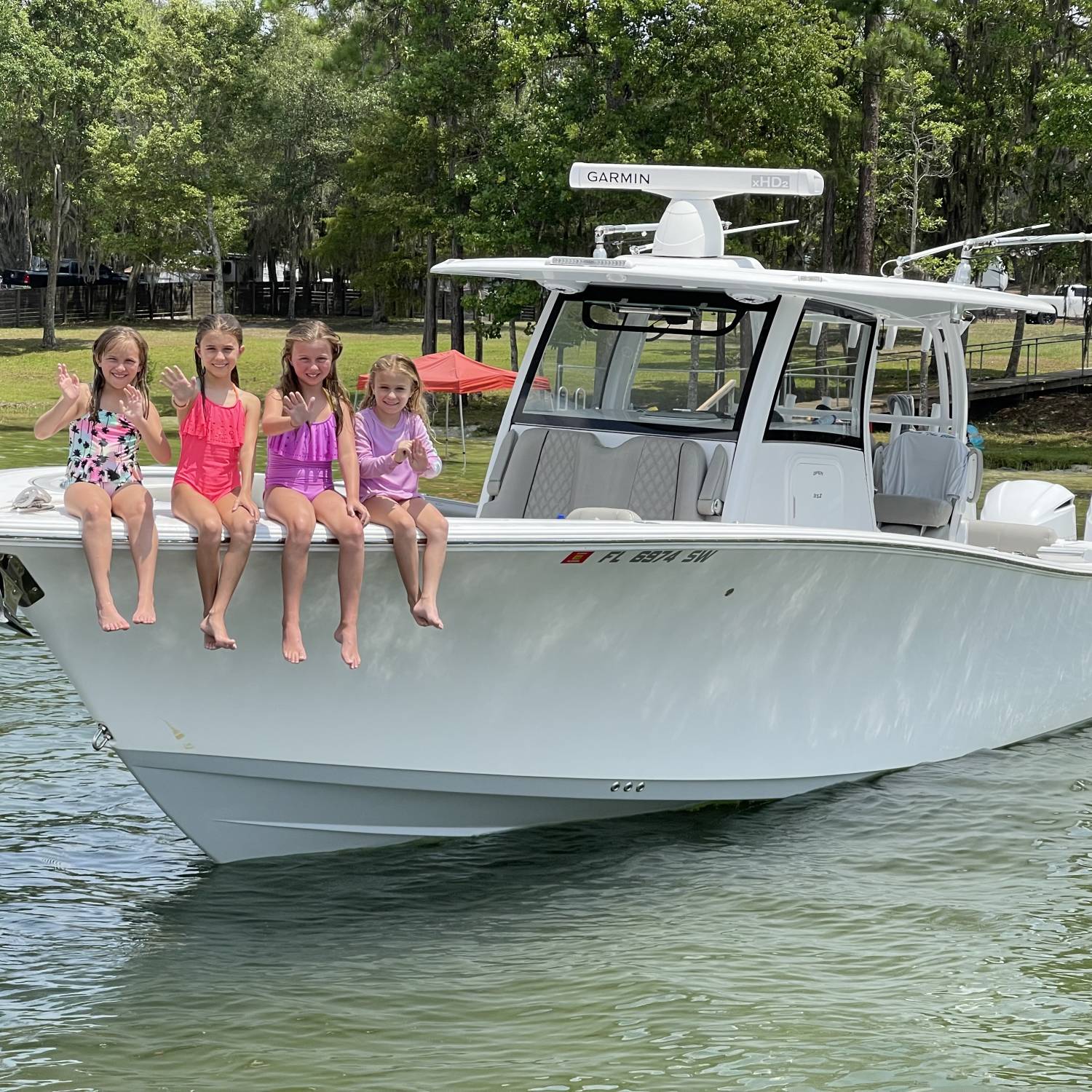 Title: Girls just wanna have fun - On board their Sportsman Open 352 Center Console - Location: Kingsley lake. Participating in the Photo Contest #SportsmanAugust2023