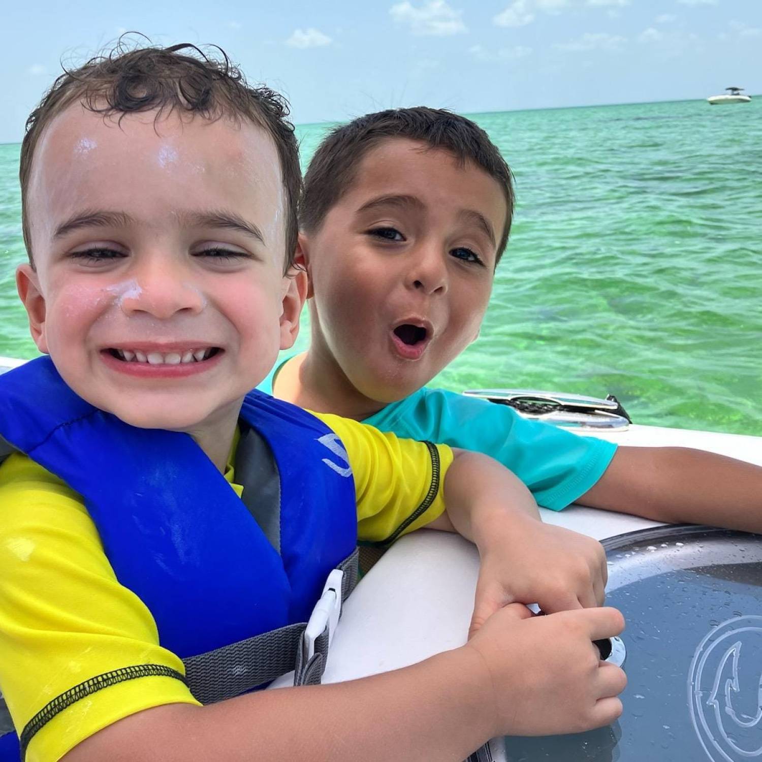 After a long and hot day. These two ocean explorers are on a sportsman enjoying the ocean.