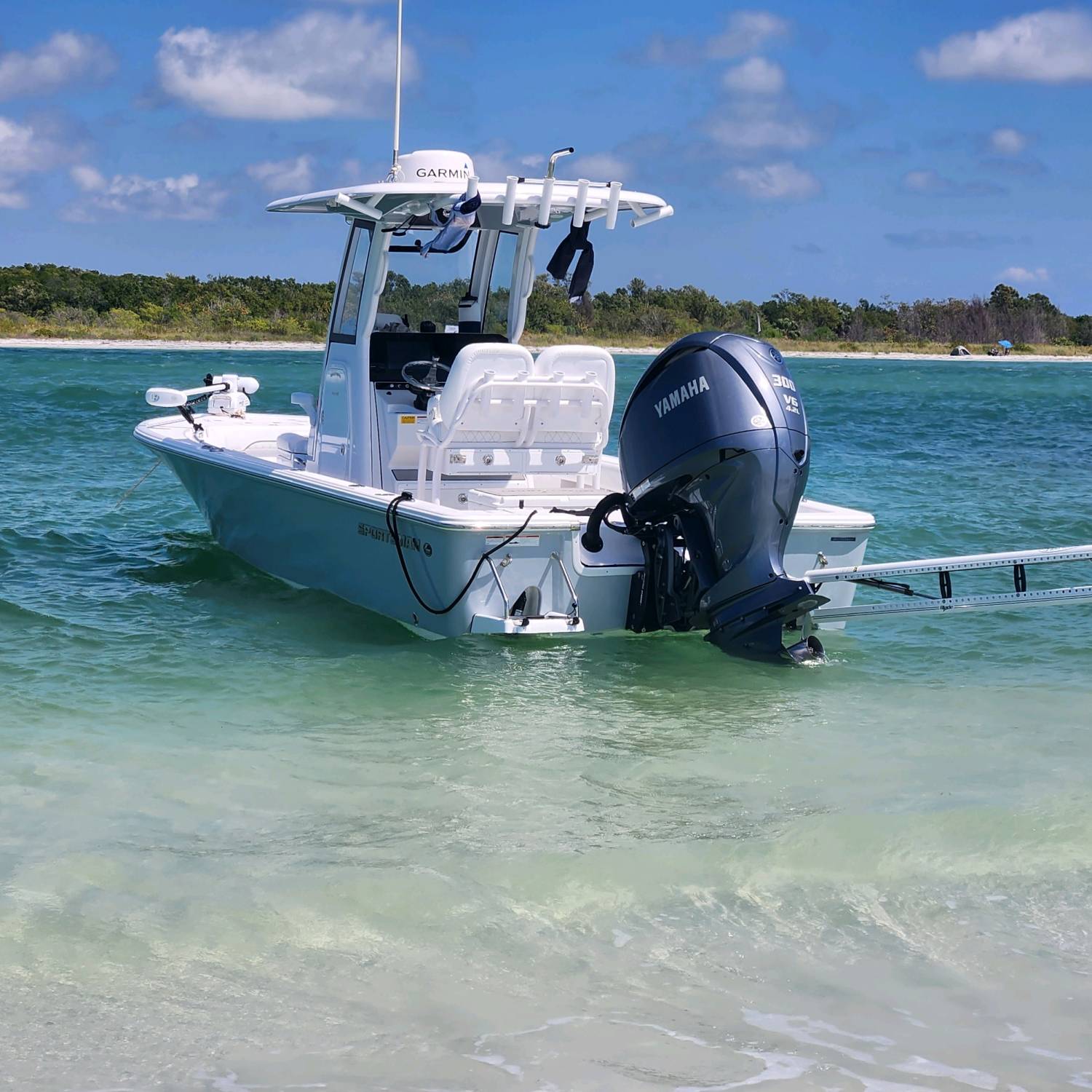 Title: At the Sandbar - On board their Sportsman Masters 247OE Bay Boat - Location: Bunces Pass. Participating in the Photo Contest #SportsmanDecember2023