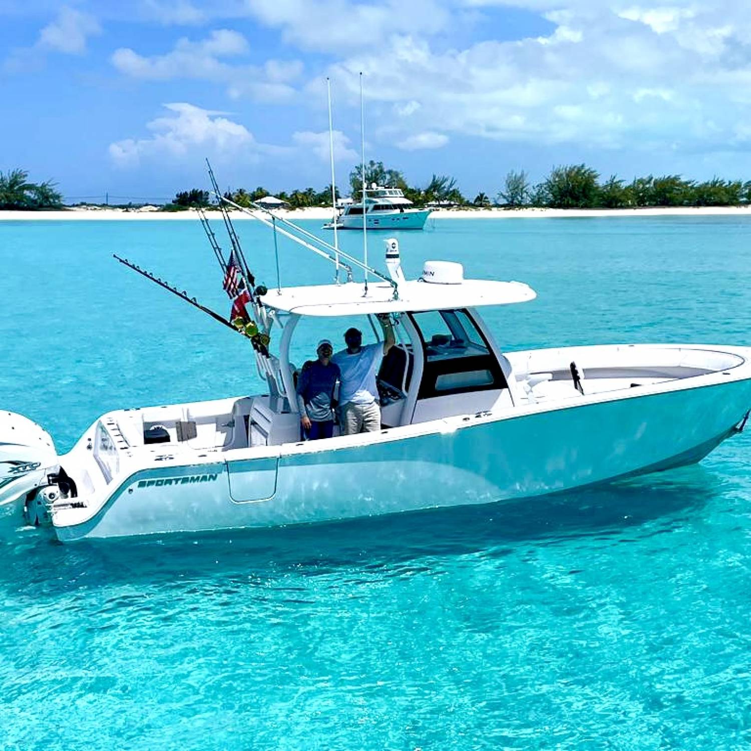 Title: In Paradise - On board their Sportsman Open 322 Center Console - Location: Calabash Bay Long Island Bahamas. Participating in the Photo Contest #SportsmanJuly2023