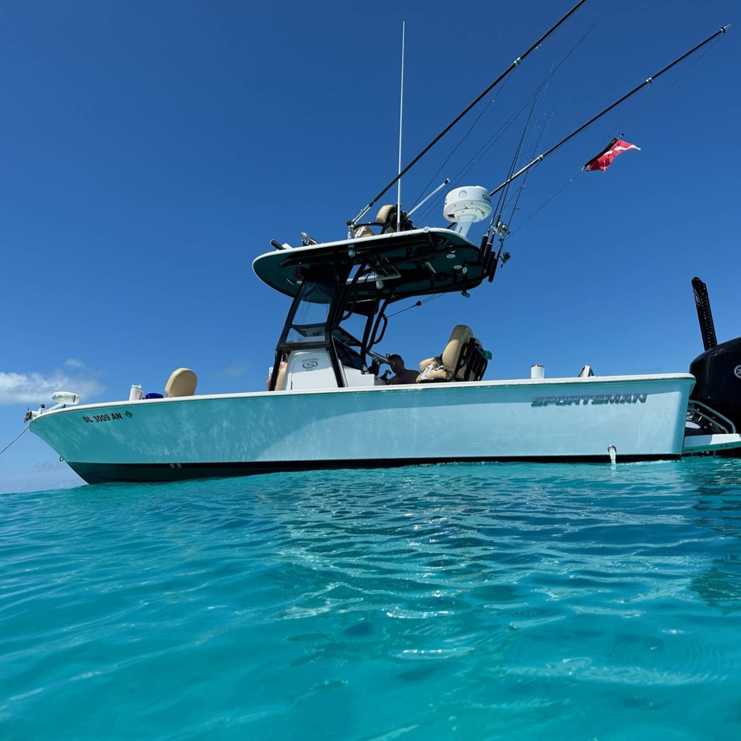 Title: Florida fun! - On board their Sportsman Masters 247OE Bay Boat - Location: Marathon, Florida Keys. Participating in the Photo Contest #SportsmanOctober2023