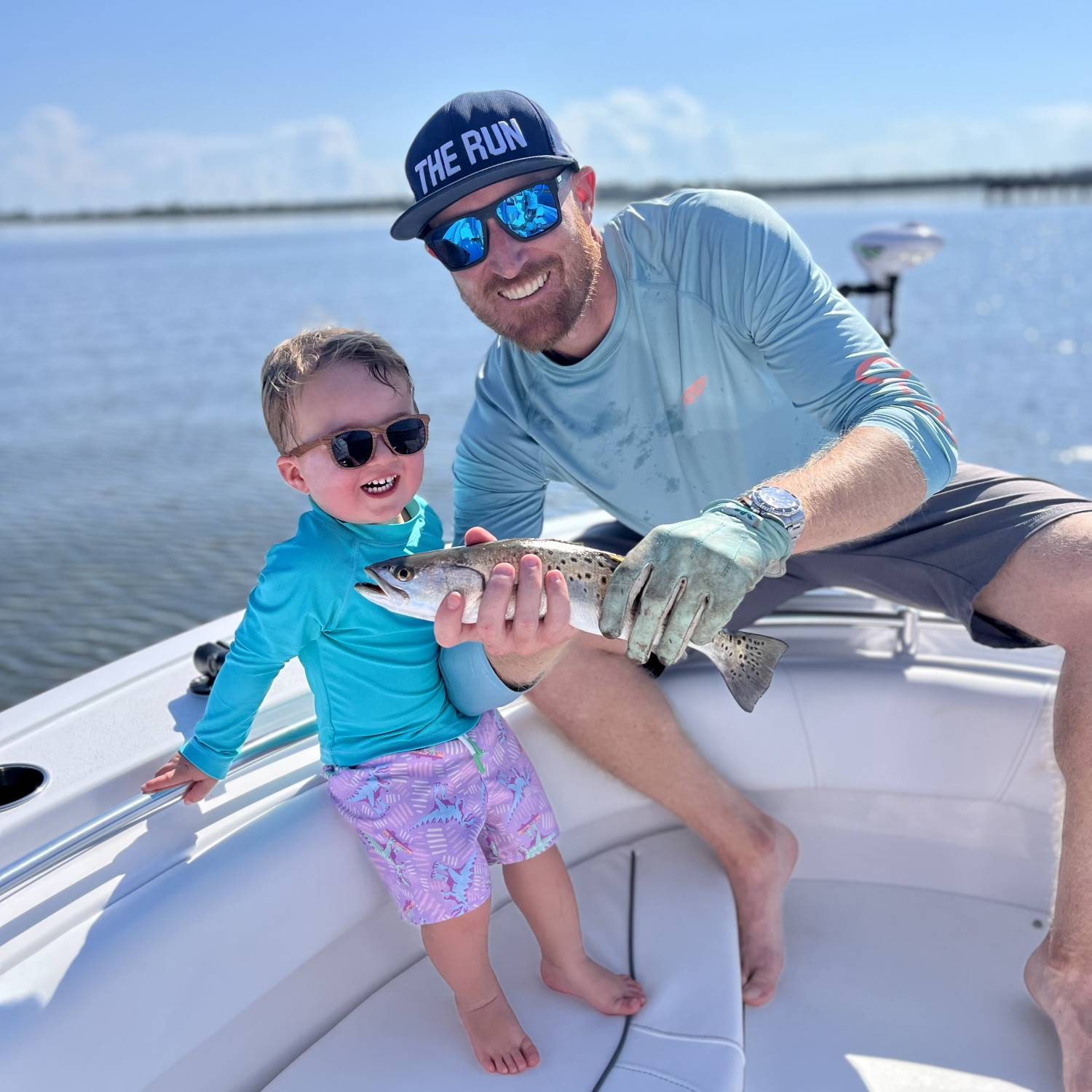 Title: Little man’s first trout - On board their Sportsman Open 232 Center Console - Location: Ponte Vedra Beach, FL. Participating in the Photo Contest #SportsmanSeptember2023