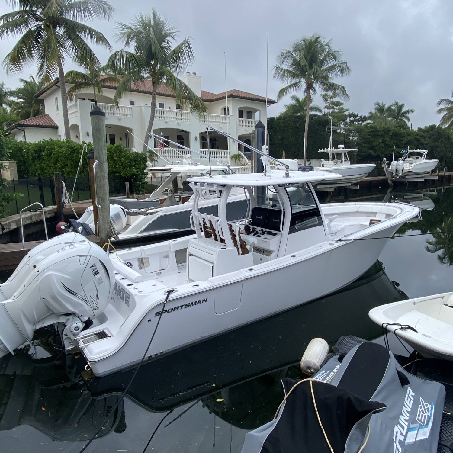 Title: In love - On board their Sportsman Open 322 Center Console - Location: Coral Gables, FL. Participating in the Photo Contest #SportsmanApril2023