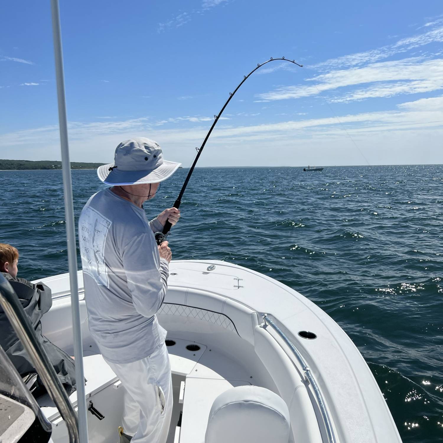 Title: Fathers Day Bent Rod - On board their Sportsman Open 212 Center Console - Location: Vineyard Sound. Participating in the Photo Contest #SportsmanJanuary2023