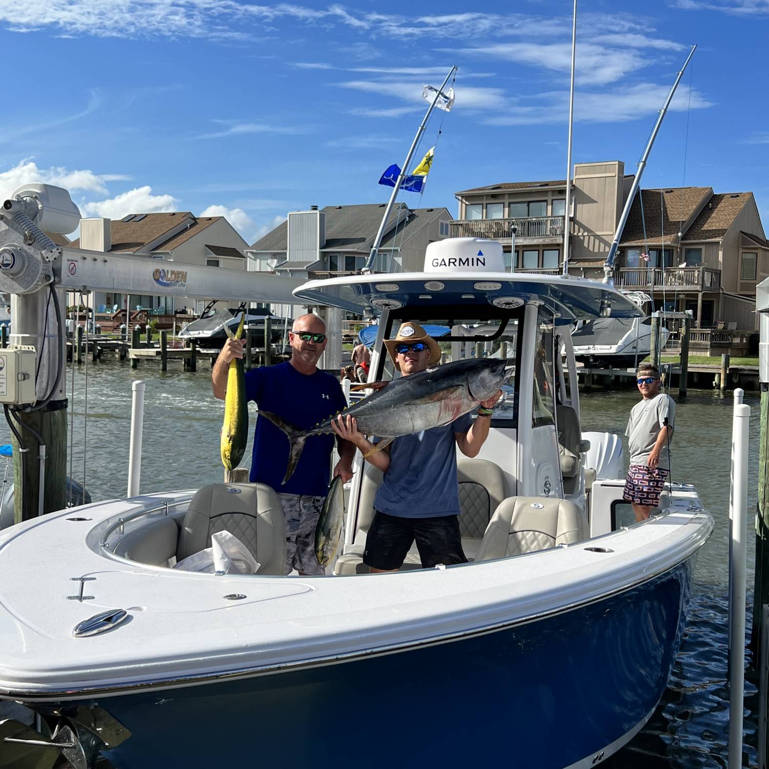 Father & Son successful day out on the water tuna & mahi and boated a white Marlin on the Powerlines...