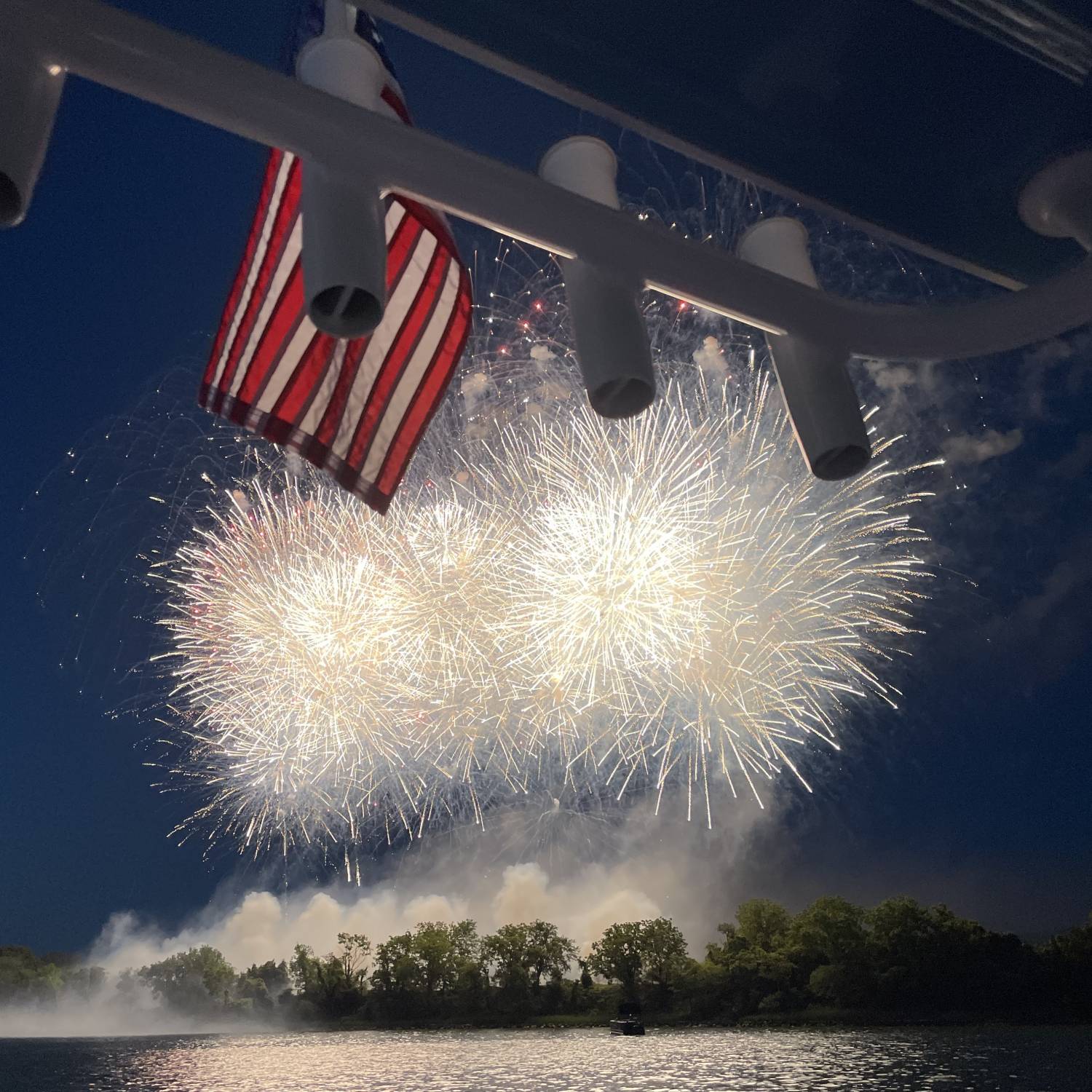 Title: And the Rocket Launchers Red Glare - On board their Sportsman Open 232 Center Console - Location: Jefferson Patterson Park on Patuxent River, Maryland. Participating in the Photo Contest #SportsmanJune2023