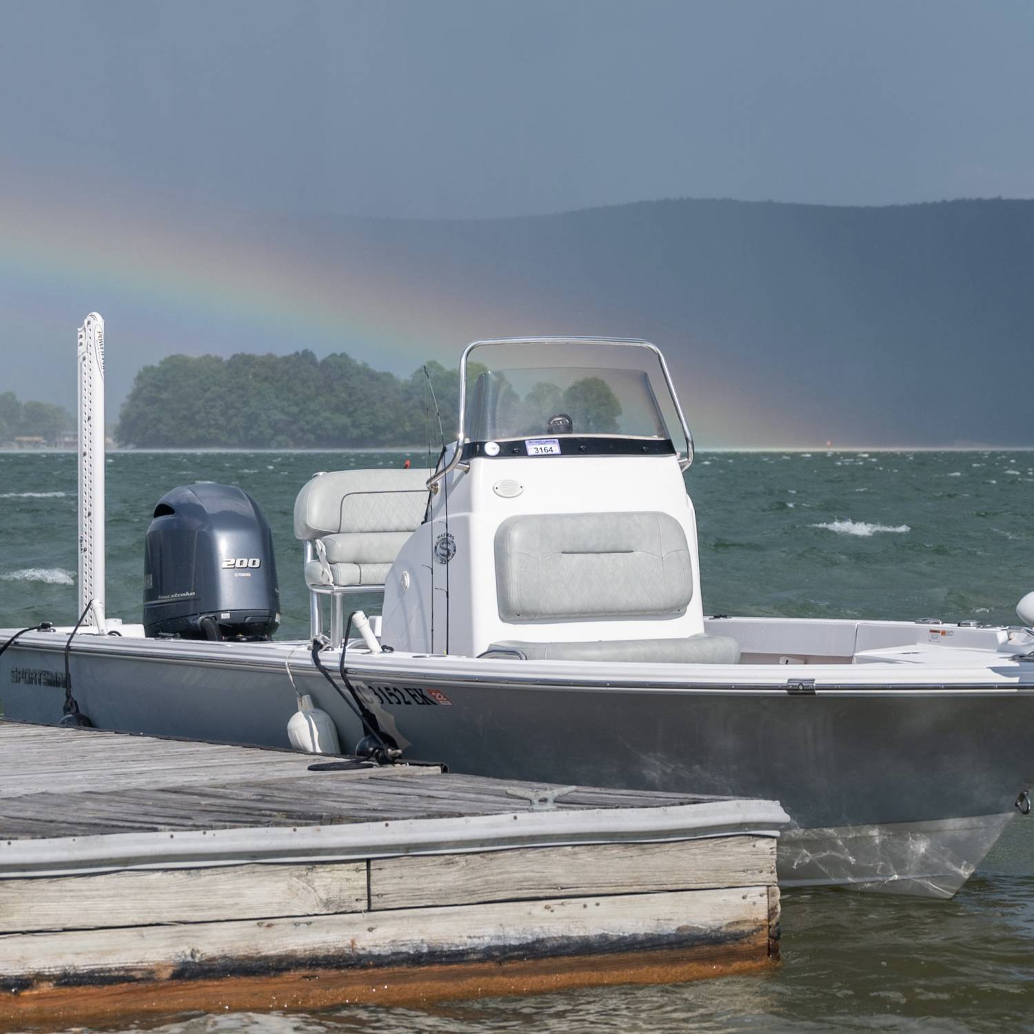 An odd storm popped up on the lake one day. Hard wind. On and off rain. Sunshine. And a massive...