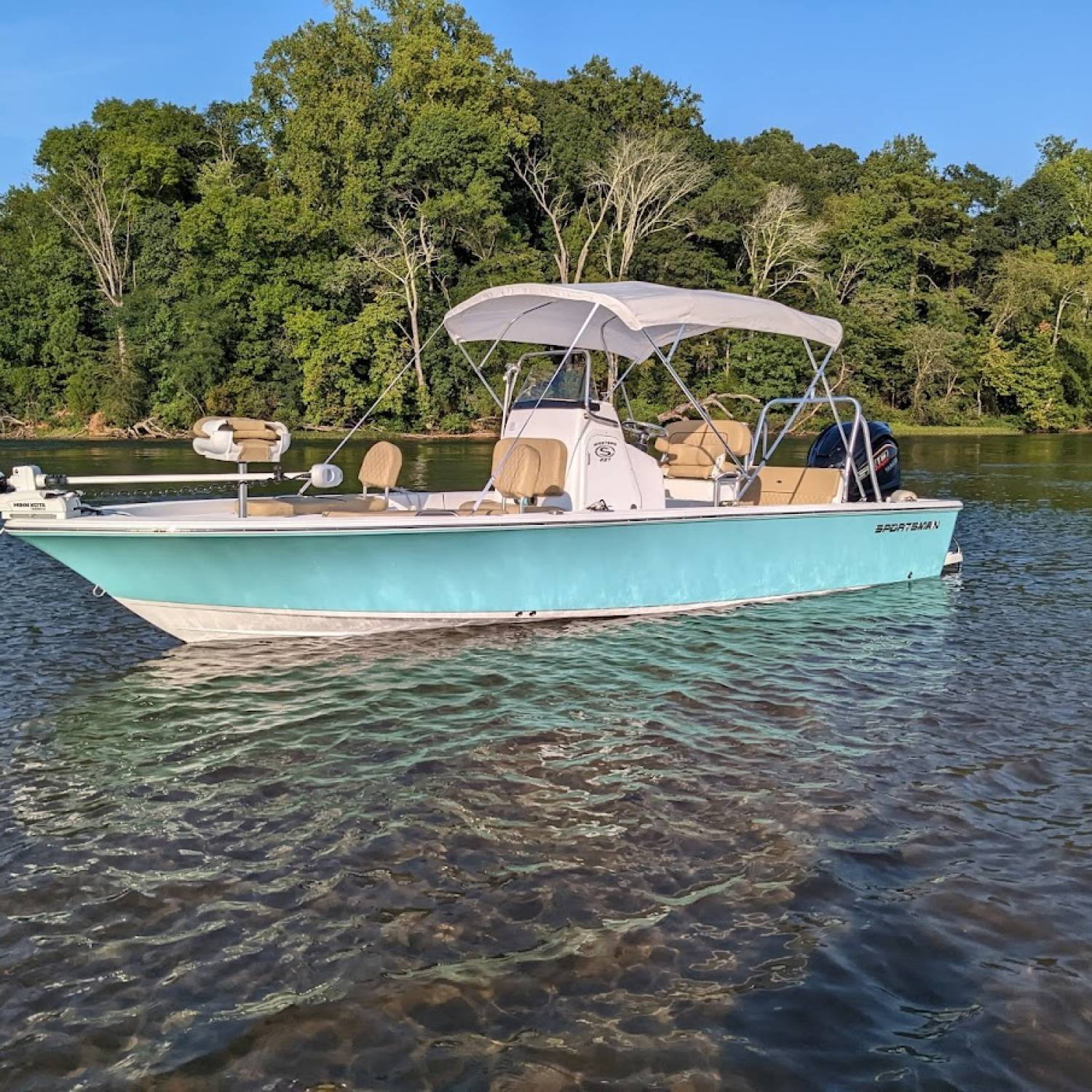 Title: Sandbar Afternoon - On board their Sportsman Masters 227 Bay Boat - Location: Mountain Island Lake. Participating in the Photo Contest #SportsmanMarch2023