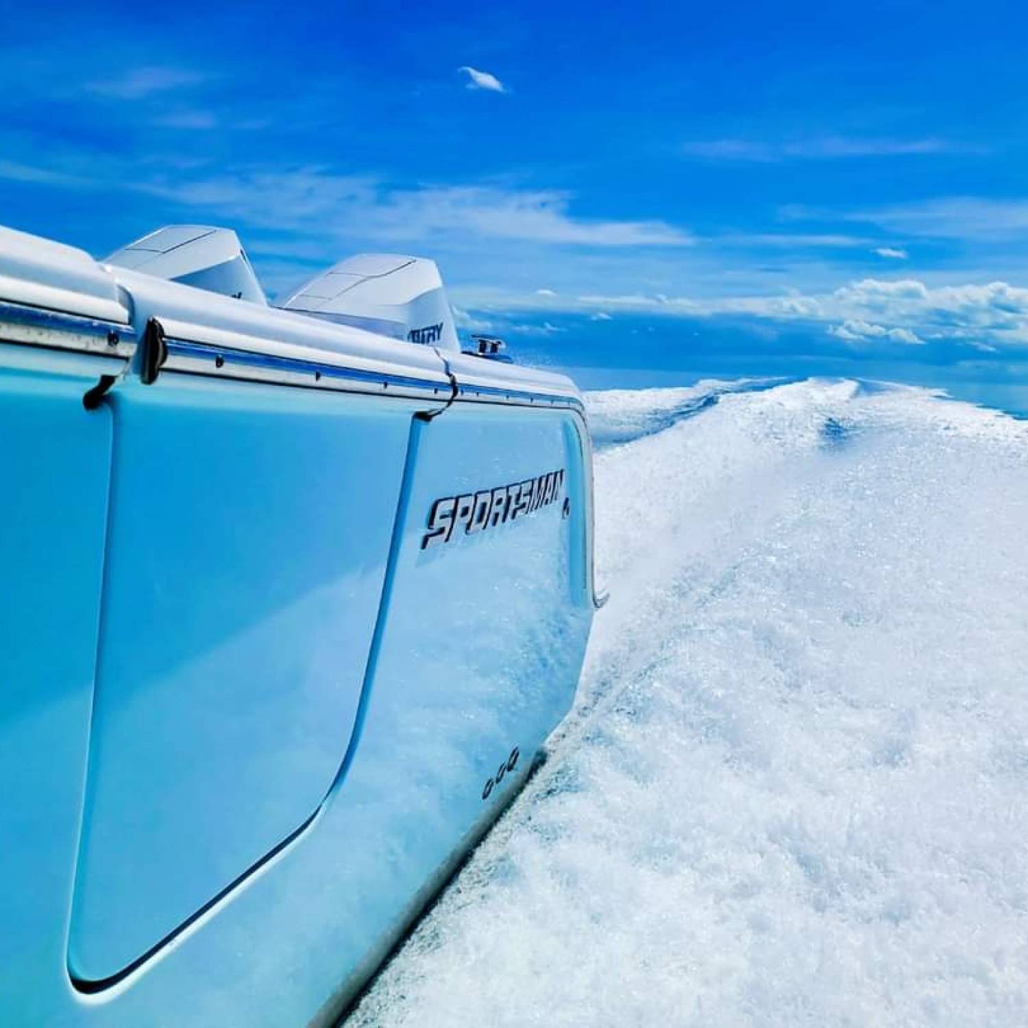 Open 322 Sportsman cruising through the Atlantic Ocean smooth as glass