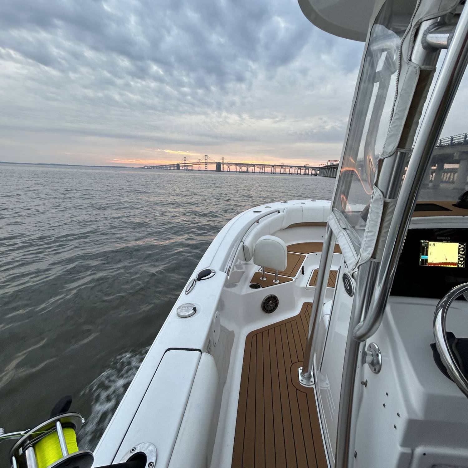 Title: Fishing by the bay bridge - On board their Sportsman Heritage 231 Center Console - Location: Glen burnie md. Participating in the Photo Contest #SportsmanFebruary2024