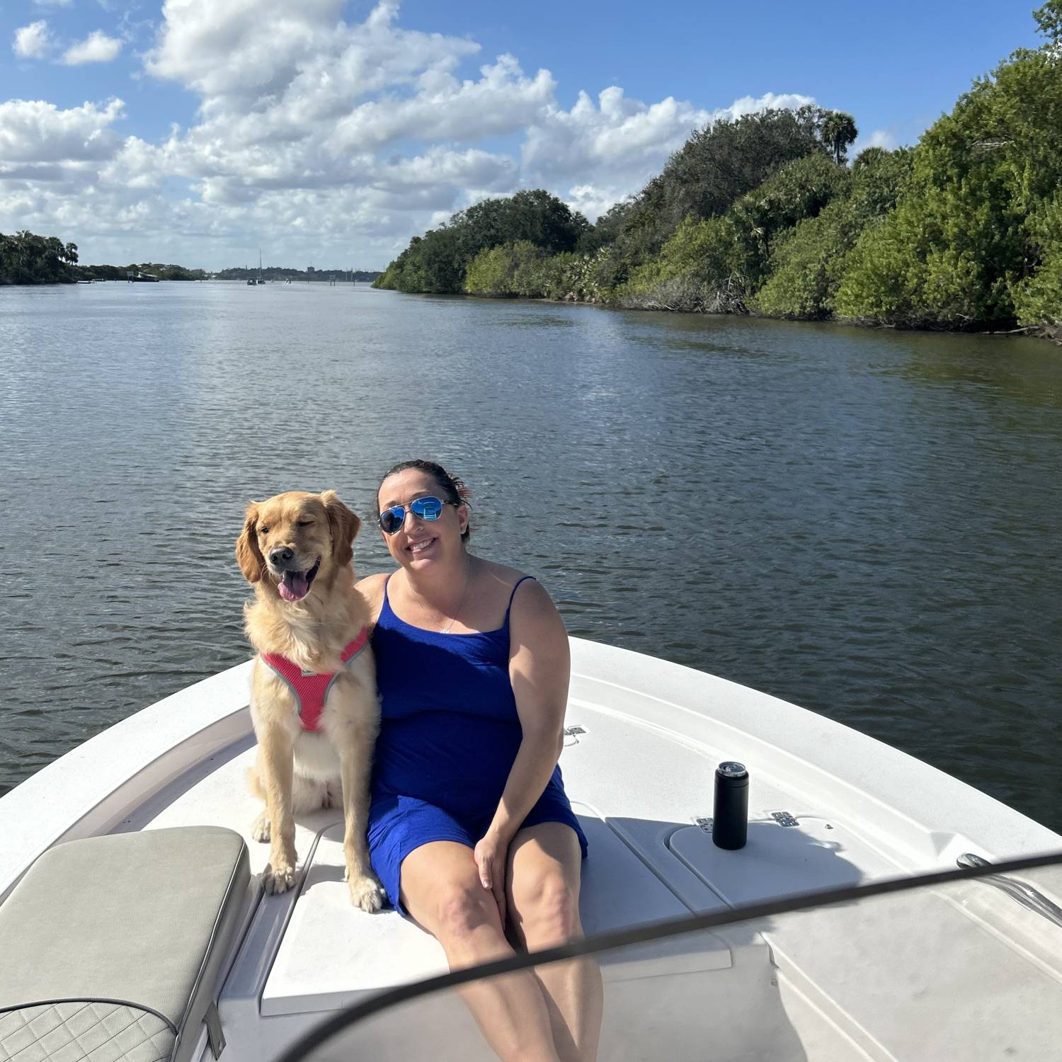 Title: Boating with our dog, Sailor. - On board their Sportsman Masters 227 Bay Boat - Location: Barge Canal in Cocoa, FL. Participating in the Photo Contest #SportsmanFebruary2024