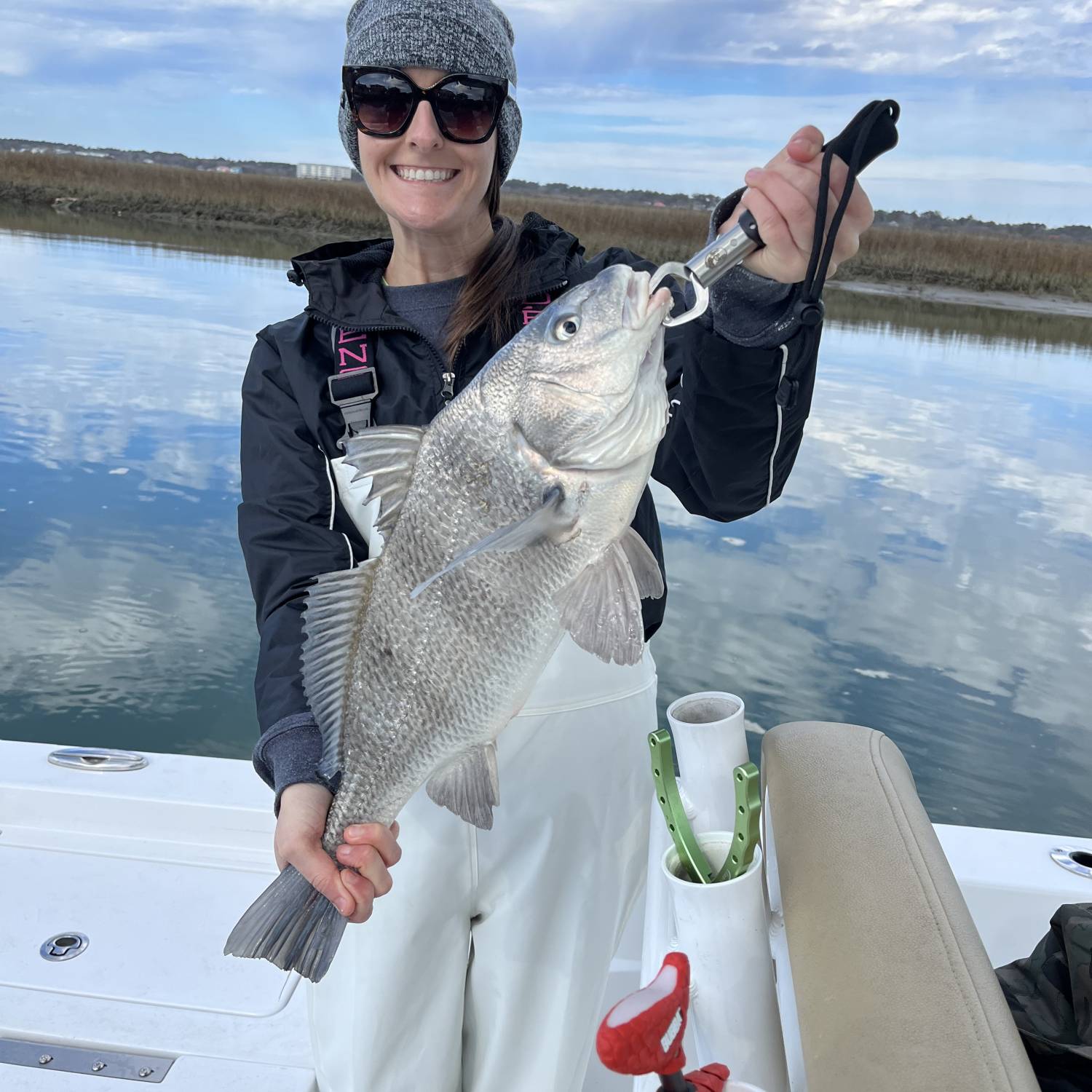 Title: Black drum in the 227 - On board their Sportsman Masters 227 Bay Boat - Location: Ocean isle beach, NC. Participating in the Photo Contest #SportsmanFebruary2024