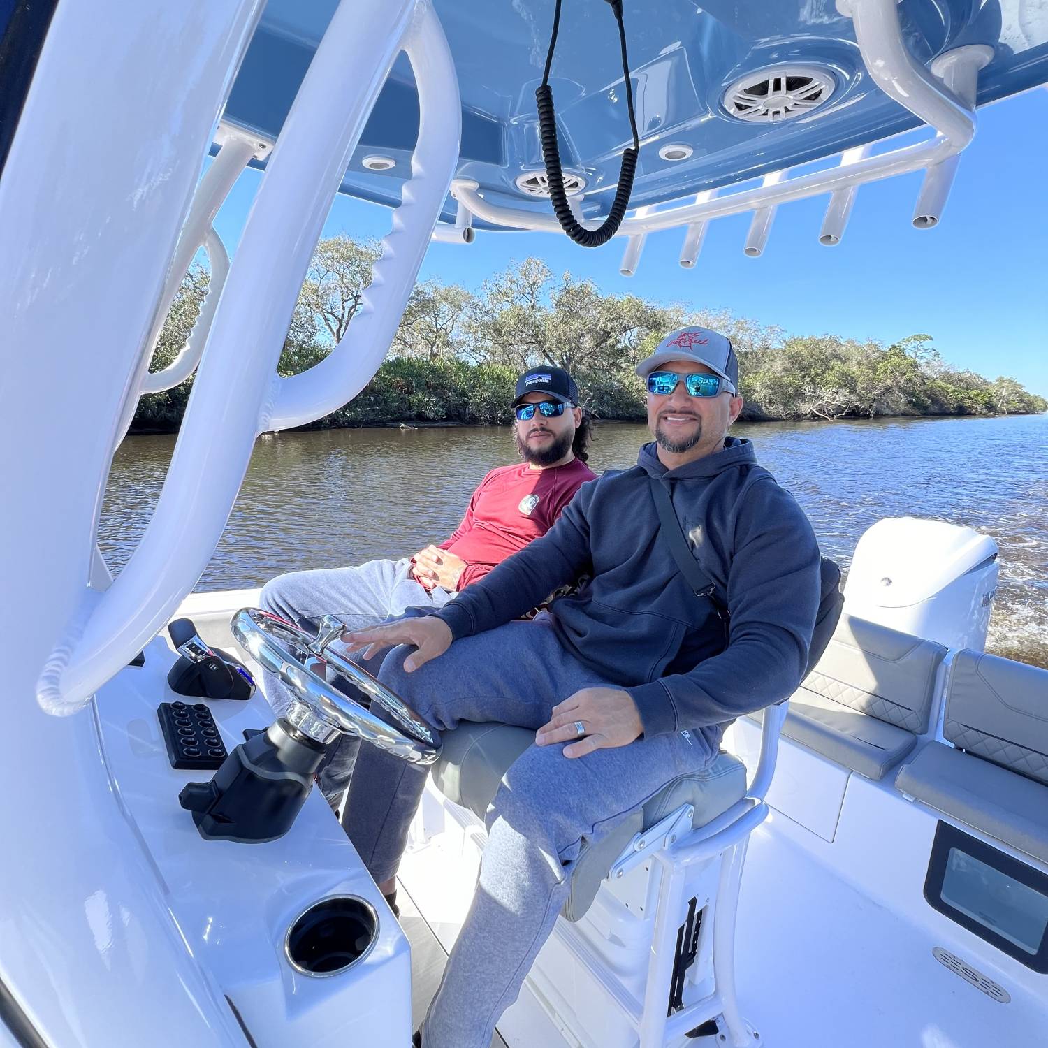 My son and I learning the boat while taking a smooth ride on the river.