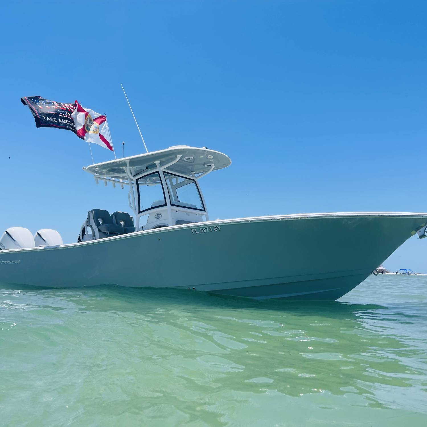 “Change Order”, just chilling at Three Rooker Bar (Island), Florida. Sporting some beautiful white twin Yamaha 300’s a Garmin and...