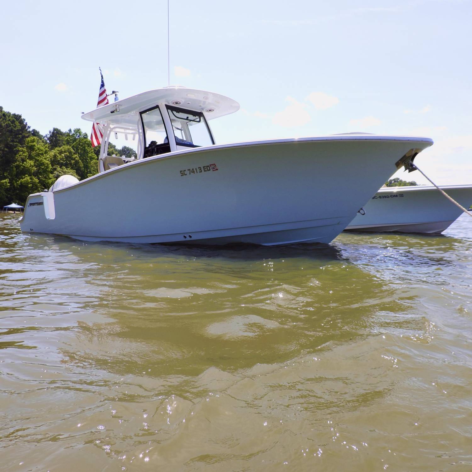 Open 282 anchored out at the sandbar on Memorial Day
