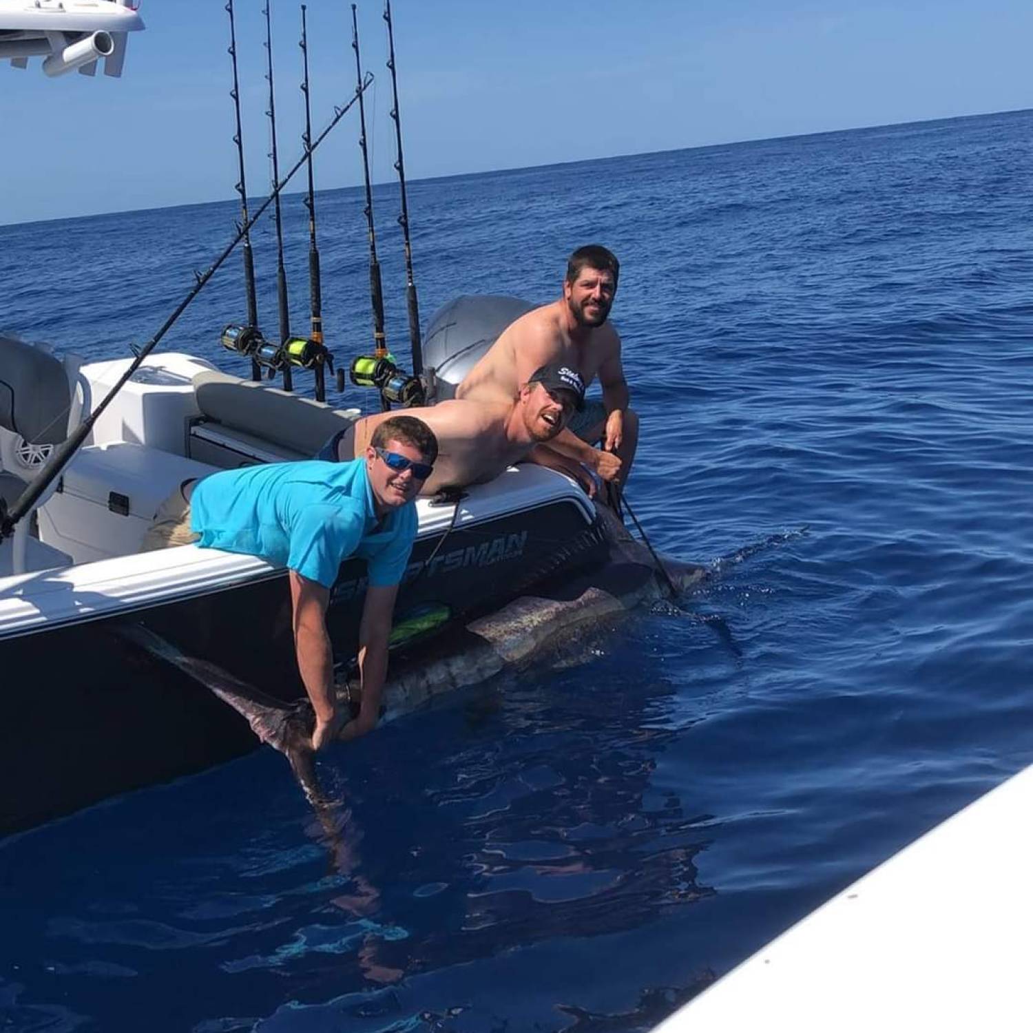 Title: 130" blue marlin off the coast of Murresl inlet SC 85 miles out - On board their Sportsman Open 232 Center Console - Location: Bubble rock. Participating in the Photo Contest #SportsmanMarch2024