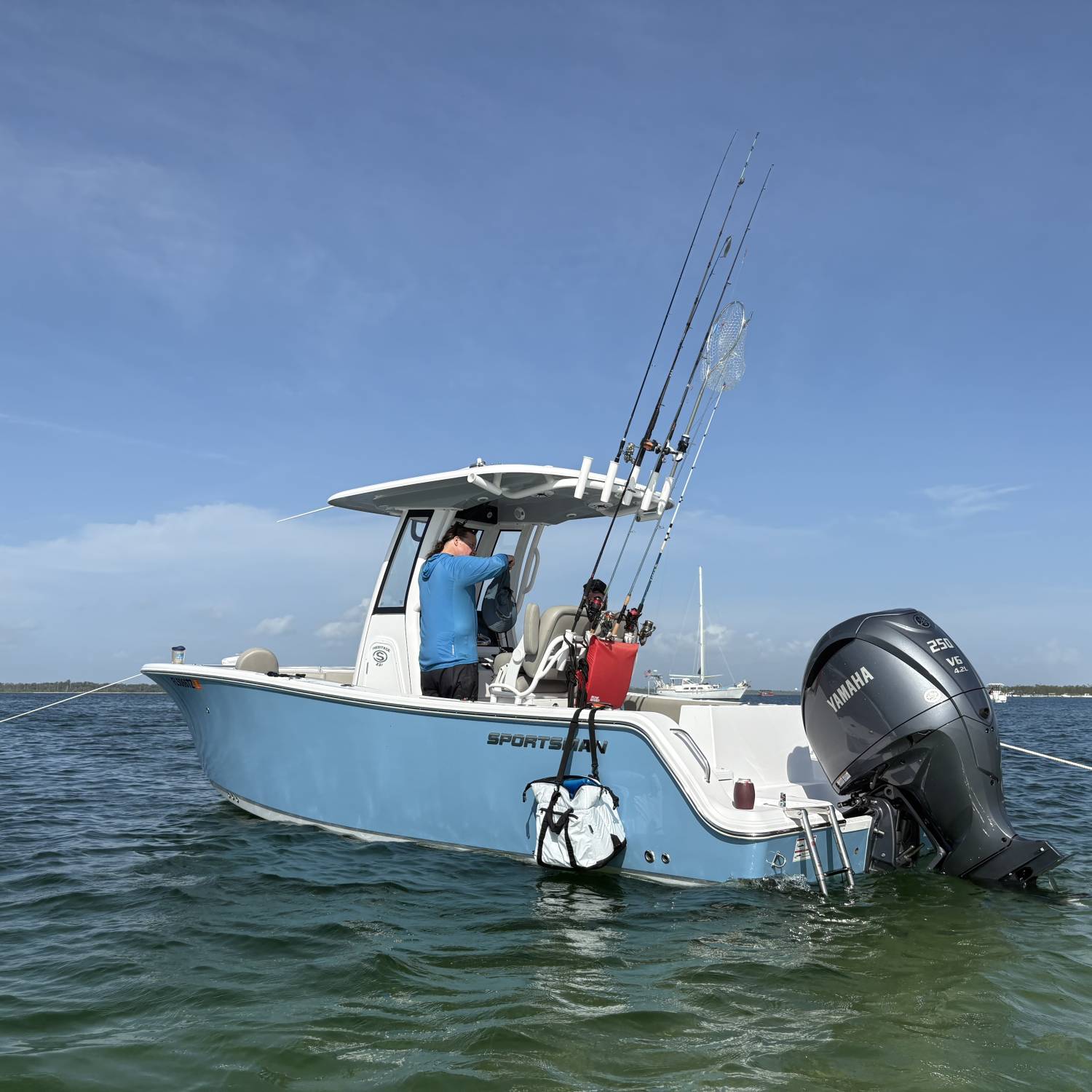 Title: Chilling at the sandbar after fishing - On board their Sportsman Heritage 231 Center Console - Location: Shell Island, Bay County, Florida. Participating in the Photo Contest #SportsmanAugust2025