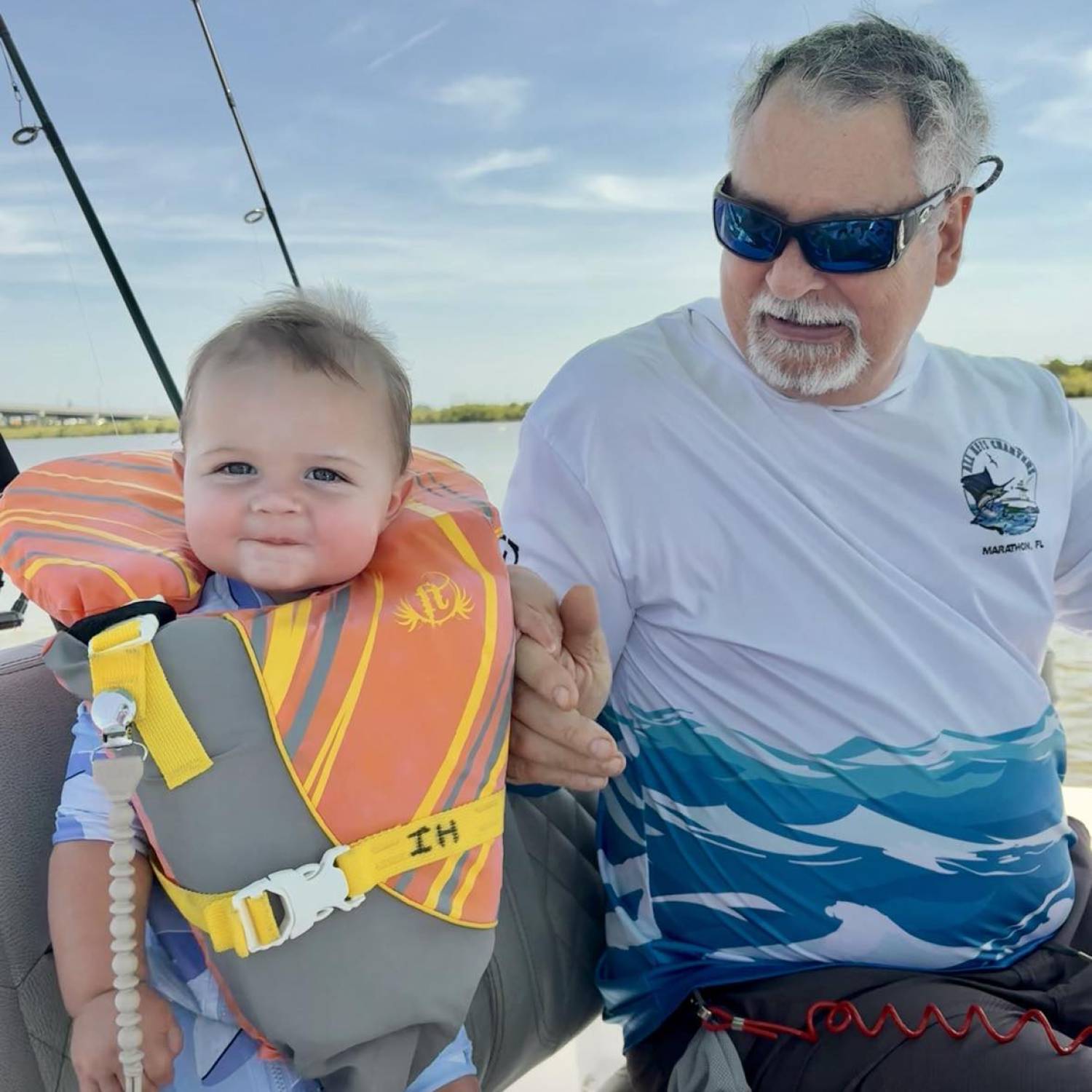 Carter Wade Jarrell enjoying boating with his grandfather.